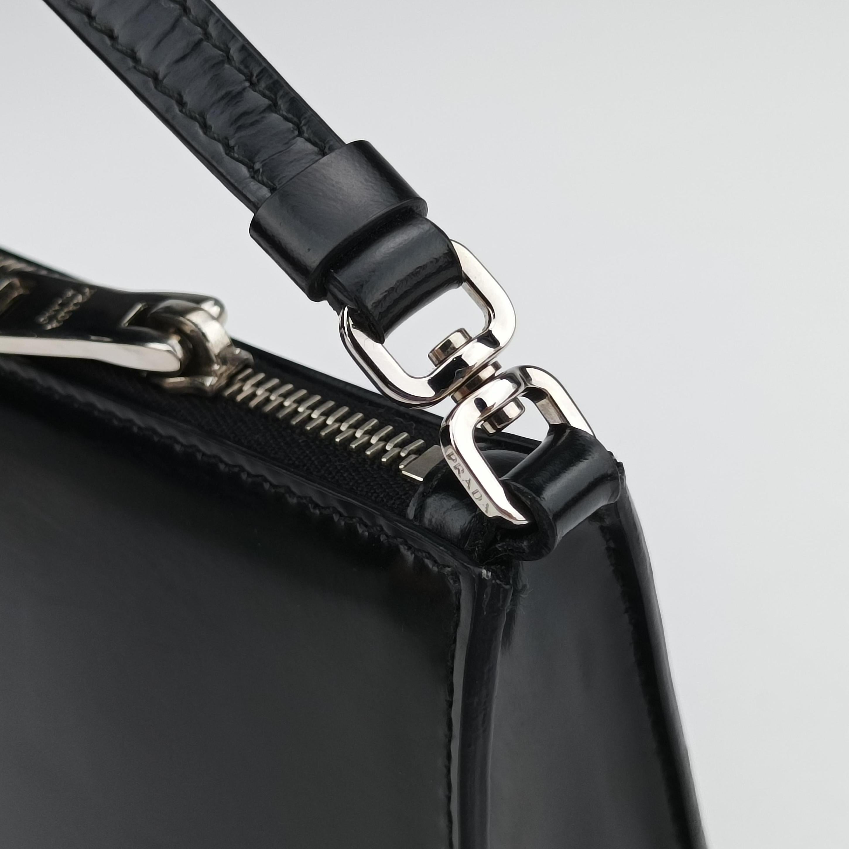 Vintage Prada Triangle Logo Black leather 1BC155 handbag | stylenewstar