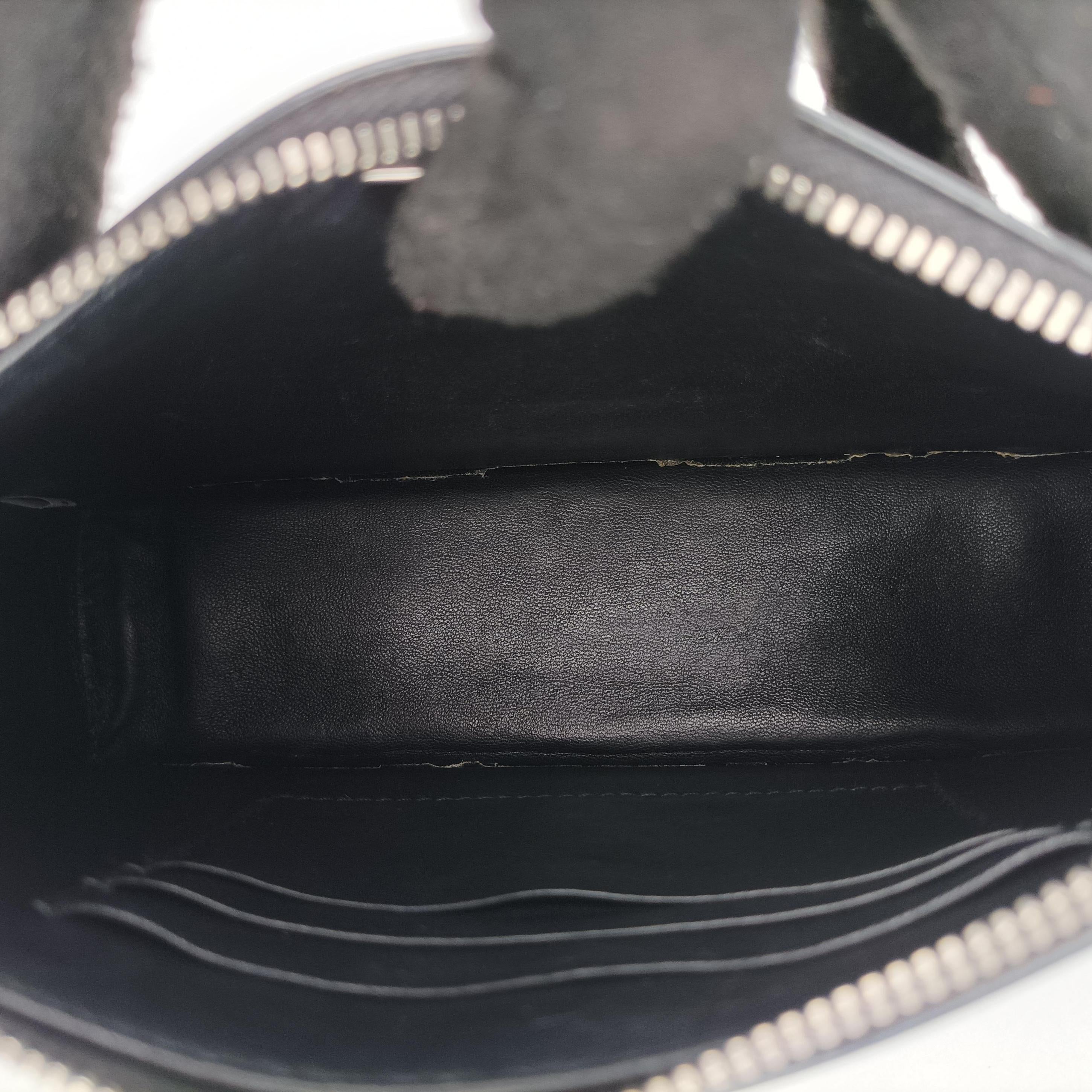 Vintage Prada Triangle Logo Black leather 1BC155 handbag | stylenewstar