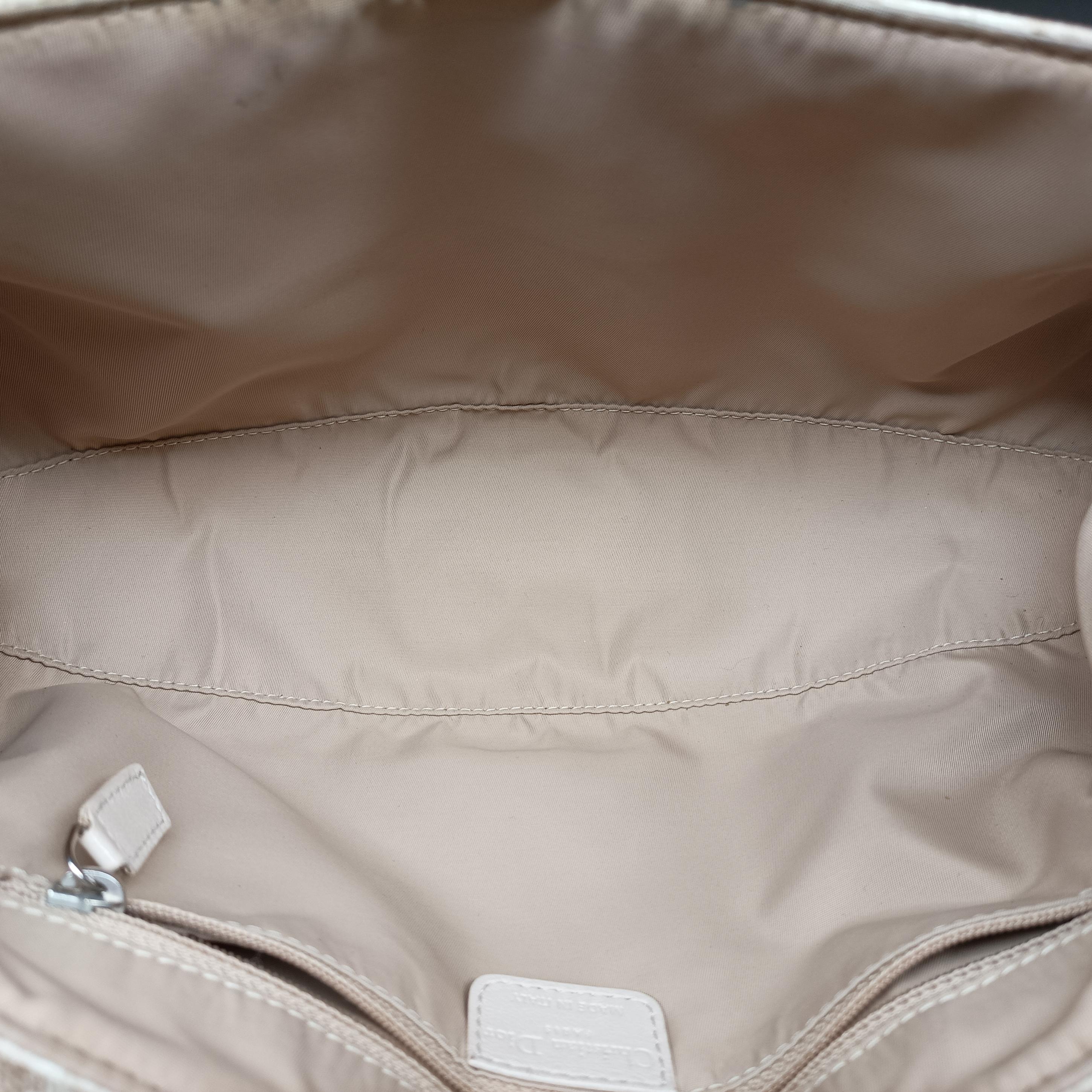 Pre-owned Christian Dior Romantique Trotter Beigex White PVC coated canvas  handbag | stylenewstar