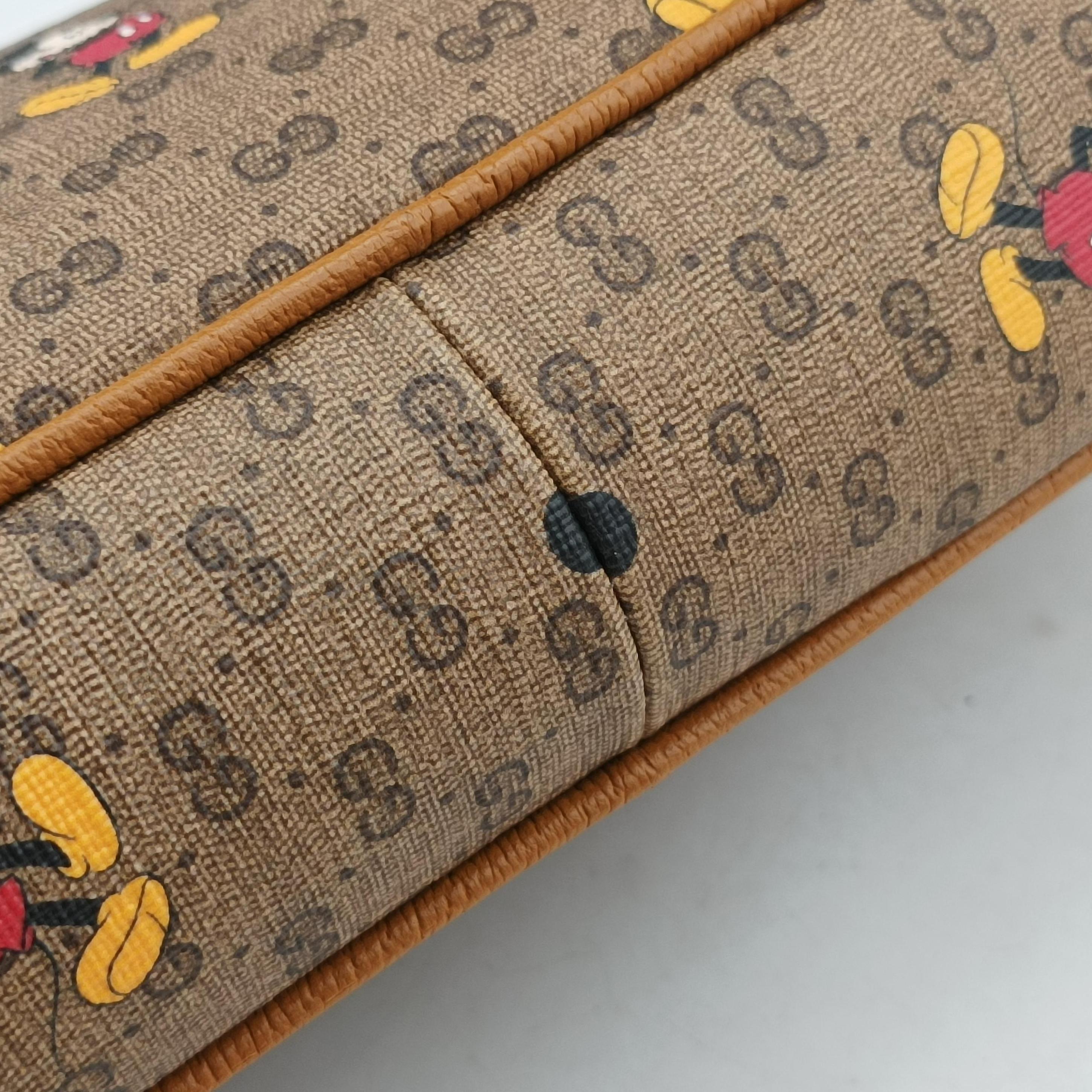 Pre-owned Gucci Mickey Mouse Disney collaboration Brown PVC coated canvas 602695 shoulderbag | stylenewstar