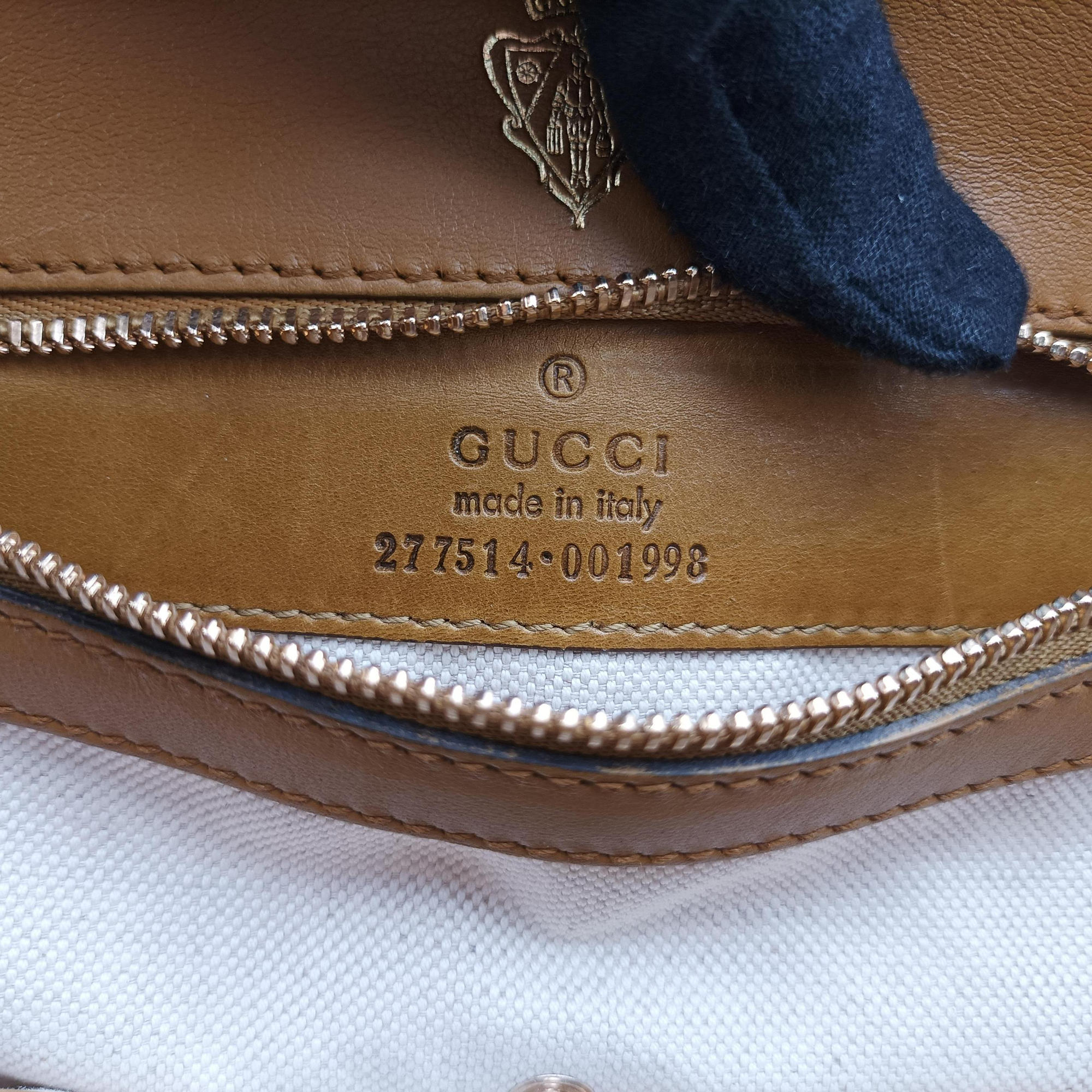 Pre-owned Gucci Stirrup Brown Leather 277514 handbag | stylenewstar