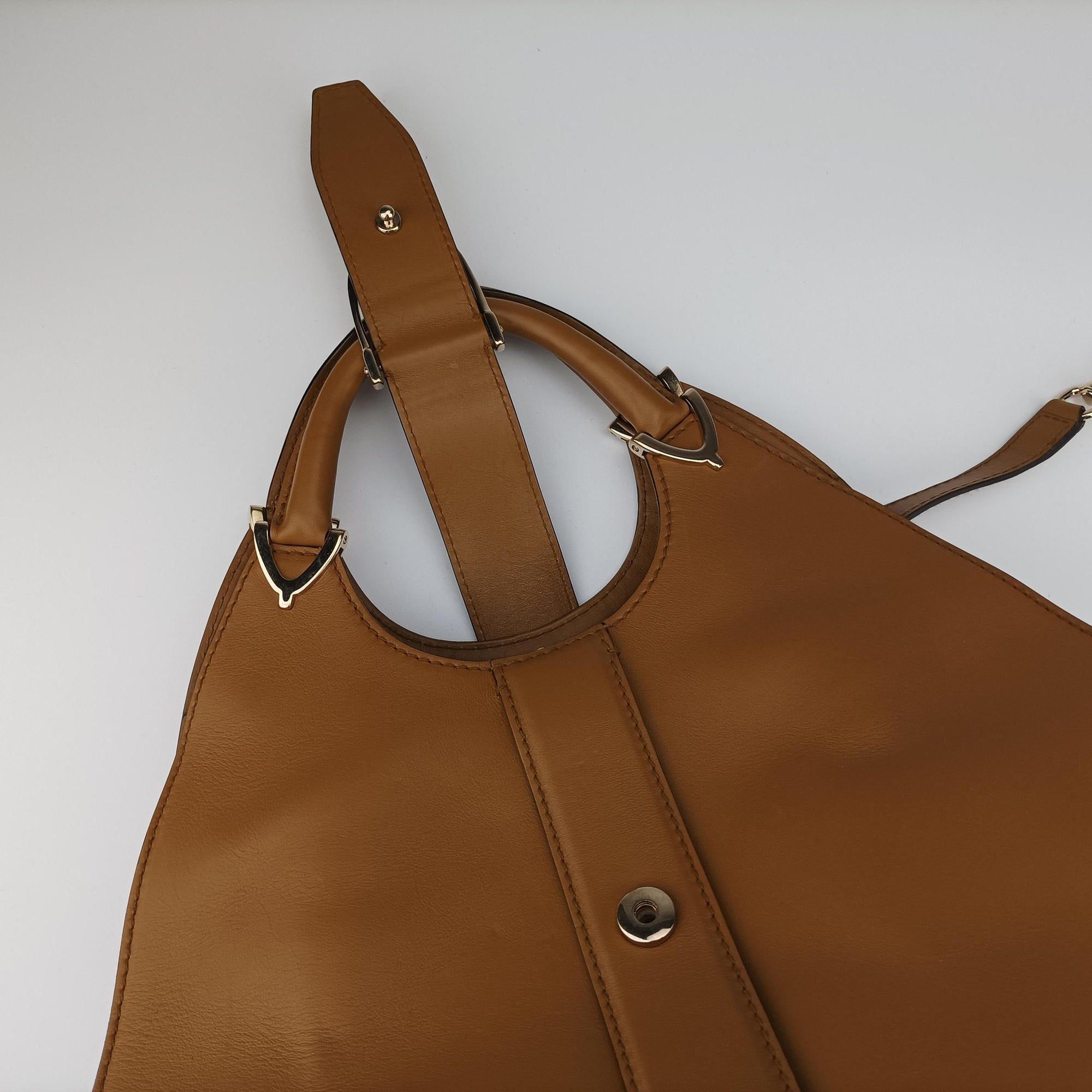 Pre-owned Gucci Stirrup Brown Leather 277514 handbag | stylenewstar