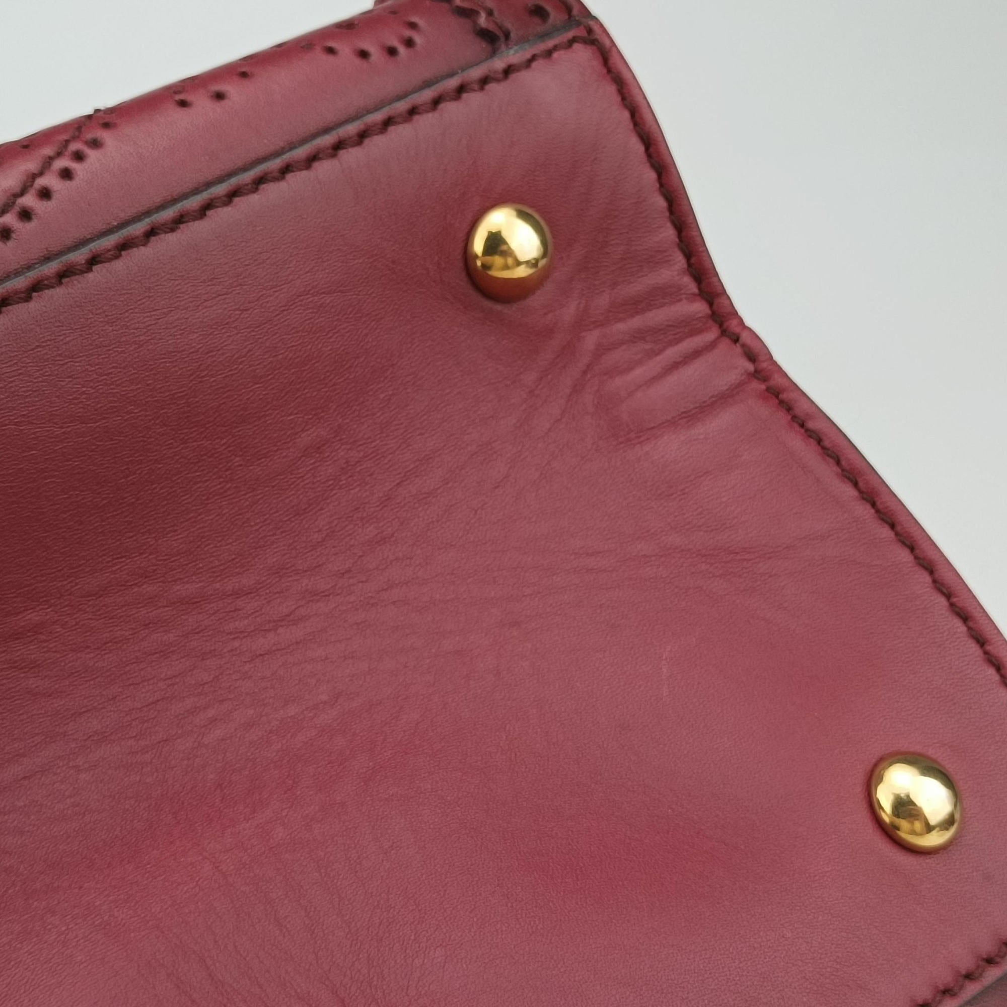 Pre-owned Gucci Duilio Brogue Burgundy Leather 296903 handbag | stylenewstar