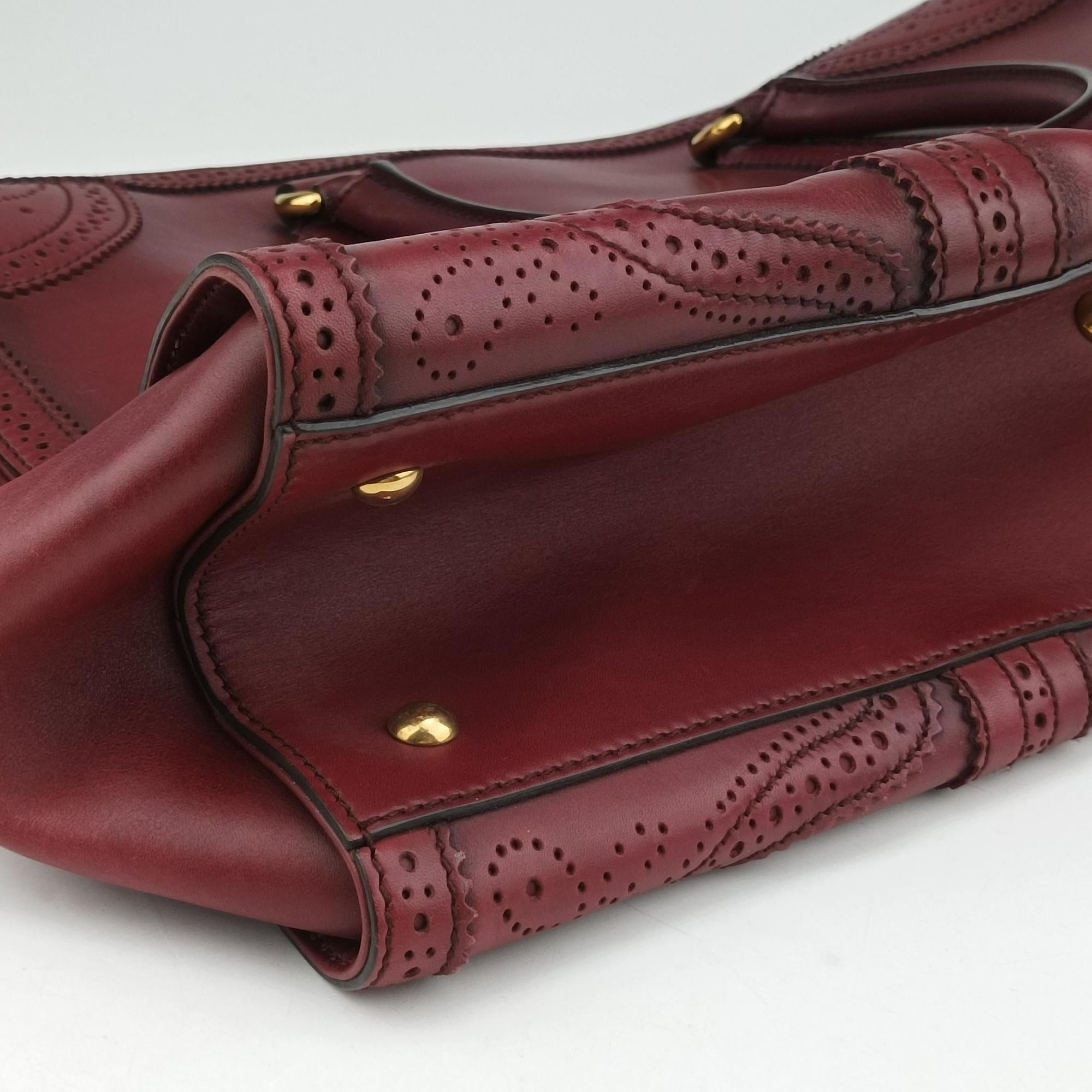 Pre-owned Gucci Duilio Brogue Burgundy Leather 296903 handbag | stylenewstar