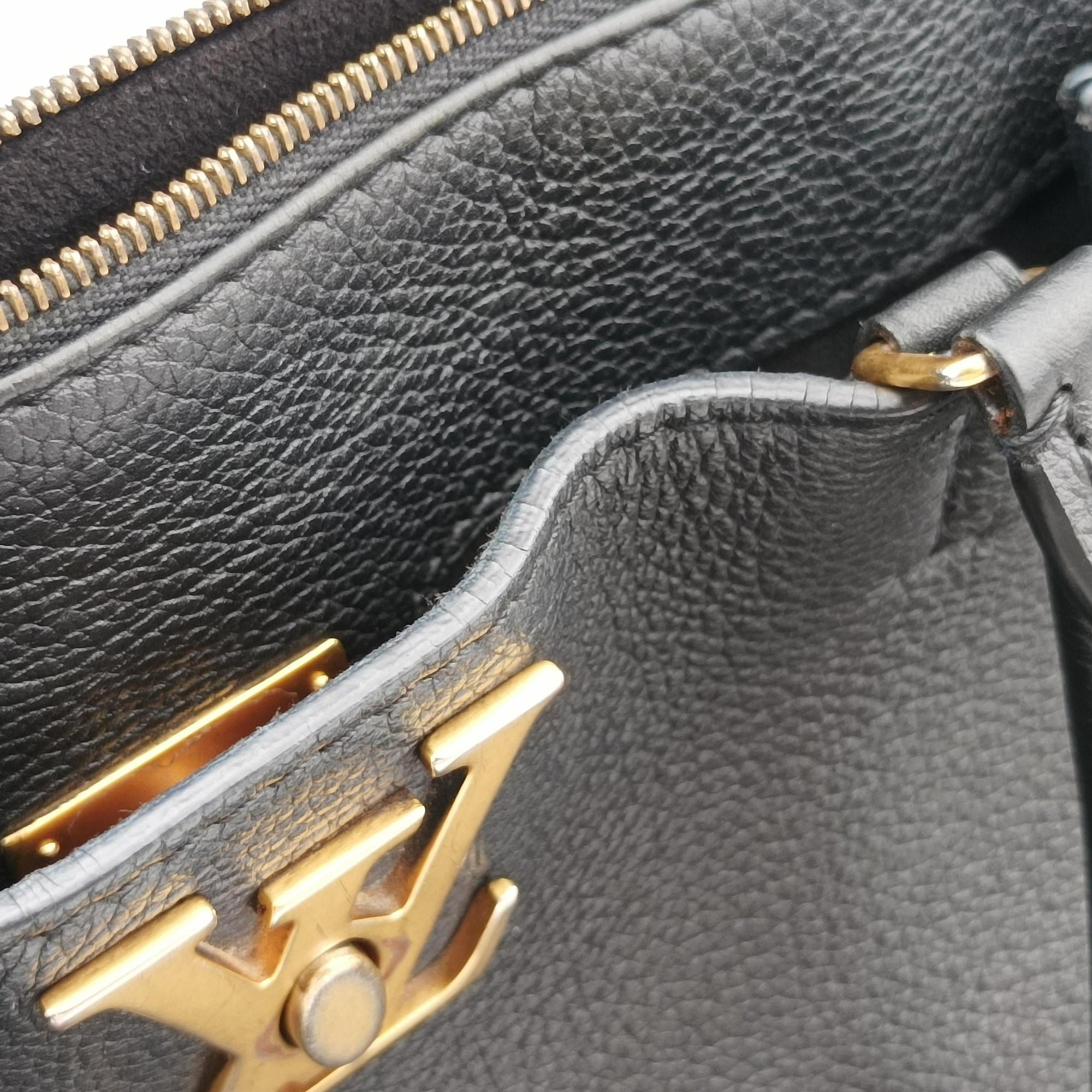 Pre-owned Louis Vuitton Rock Meto Black leather M54569 handbag | stylenewstar