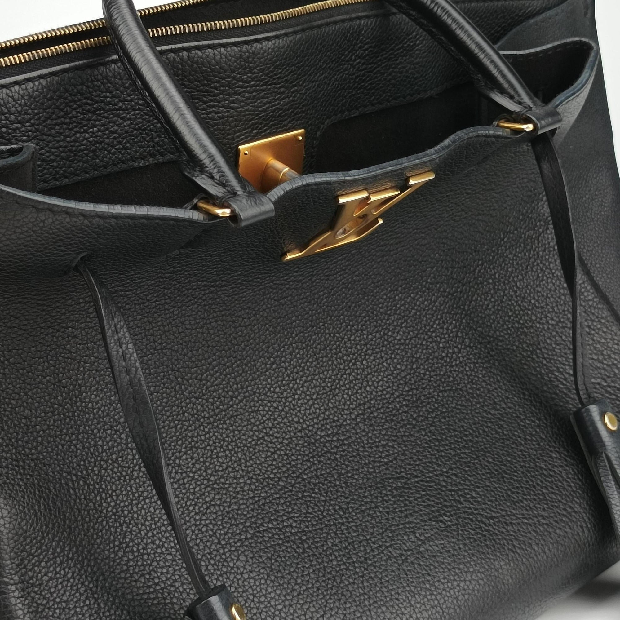 Pre-owned Louis Vuitton Rock Meto Black leather M54569 handbag | stylenewstar