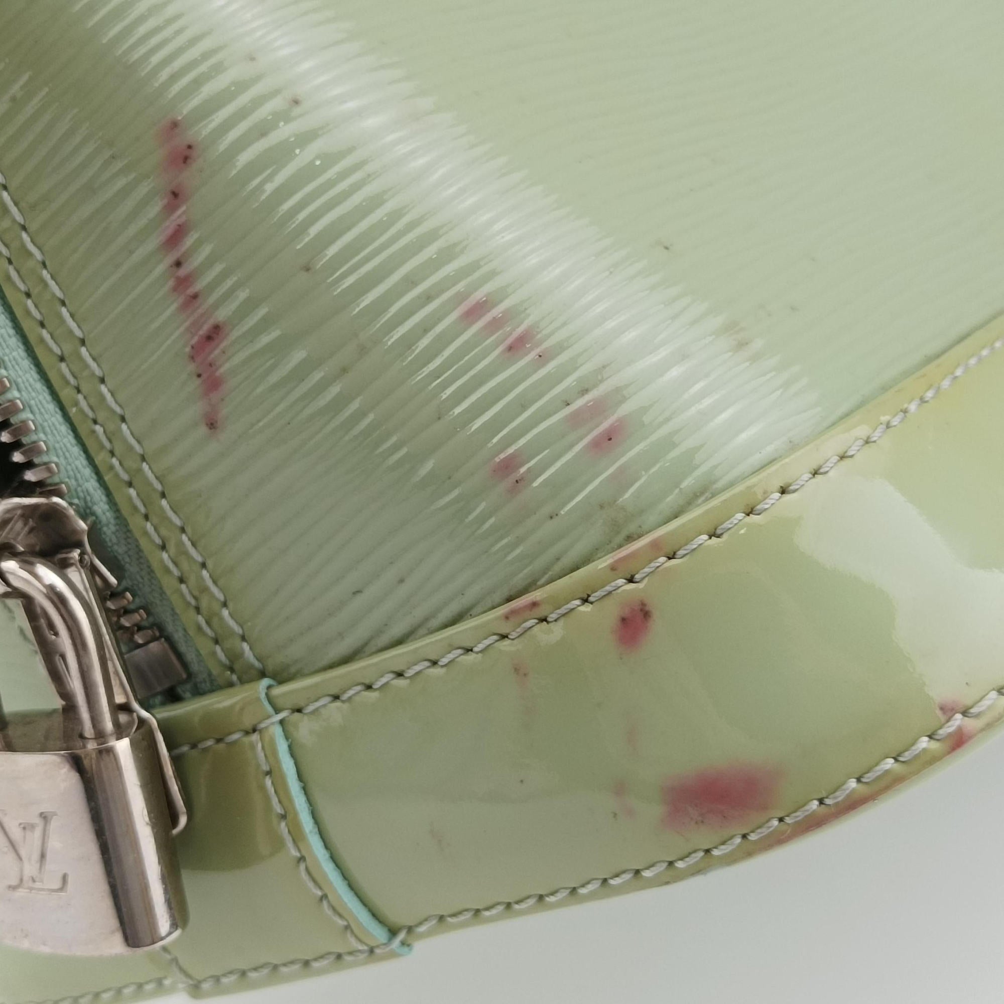 Pre-owned Louis Vuitton Alma PM Amando Electric epi M40625 handbag | stylenewstar