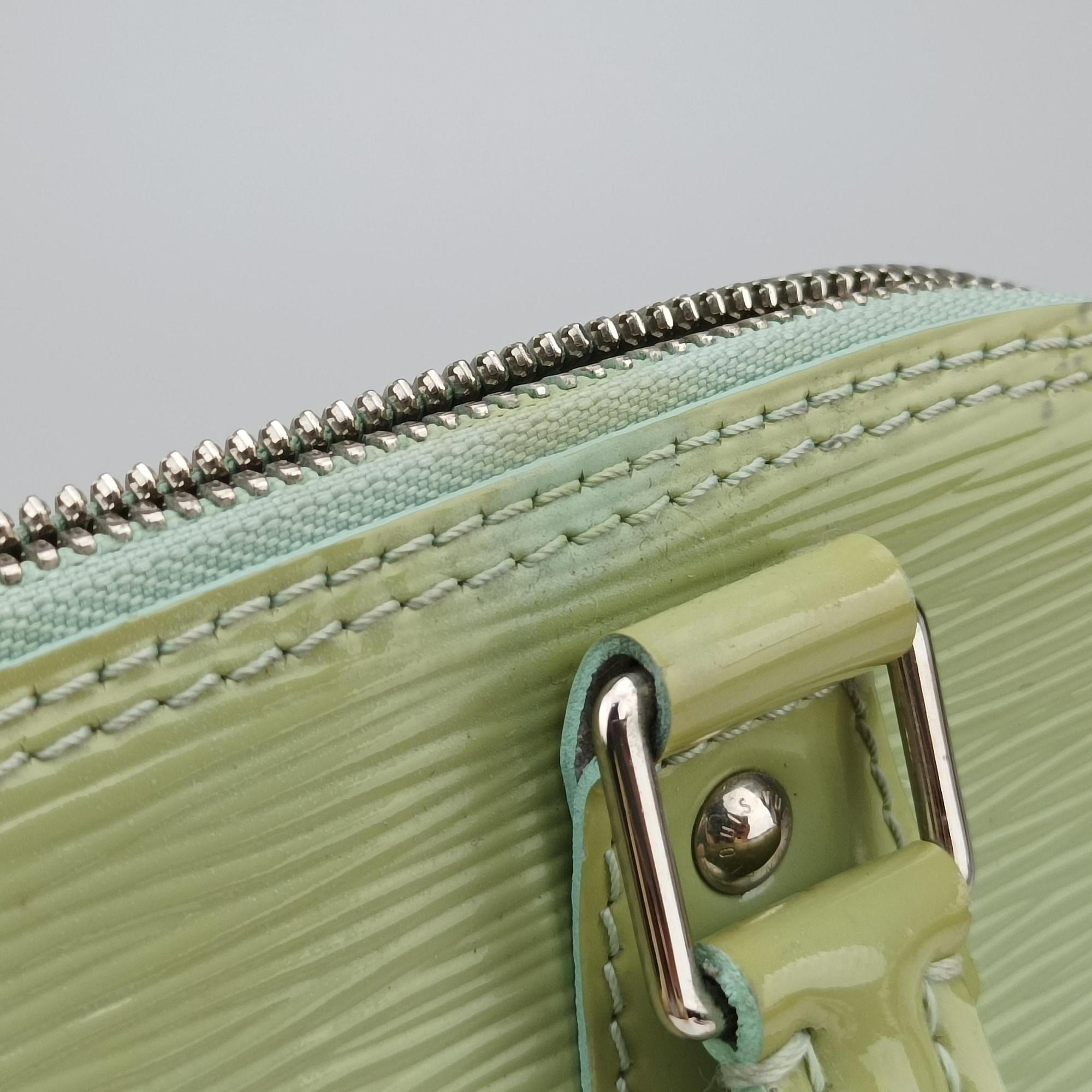 Pre-owned Louis Vuitton Alma PM Amando Electric epi M40625 handbag | stylenewstar