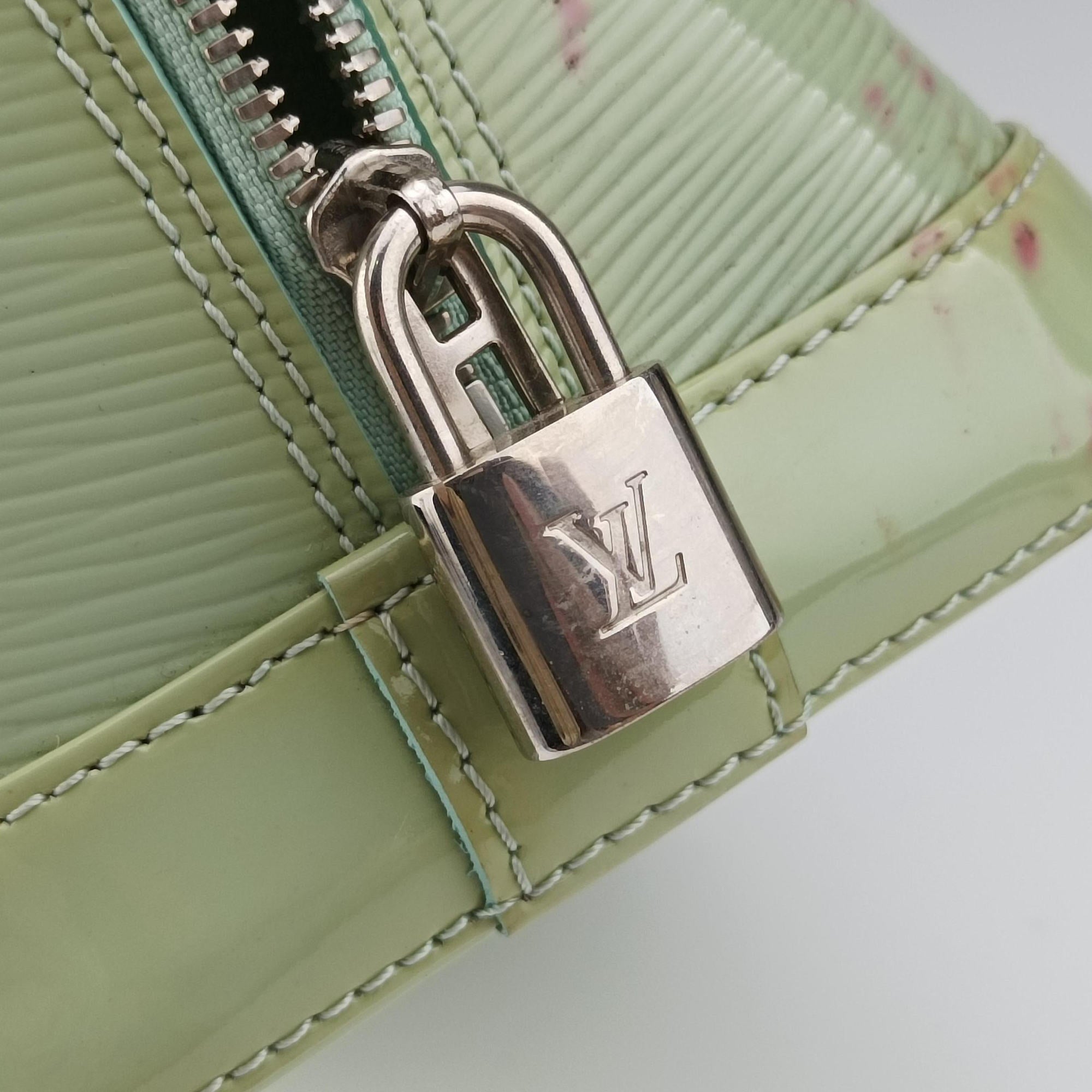 Pre-owned Louis Vuitton Alma PM Amando Electric epi M40625 handbag | stylenewstar