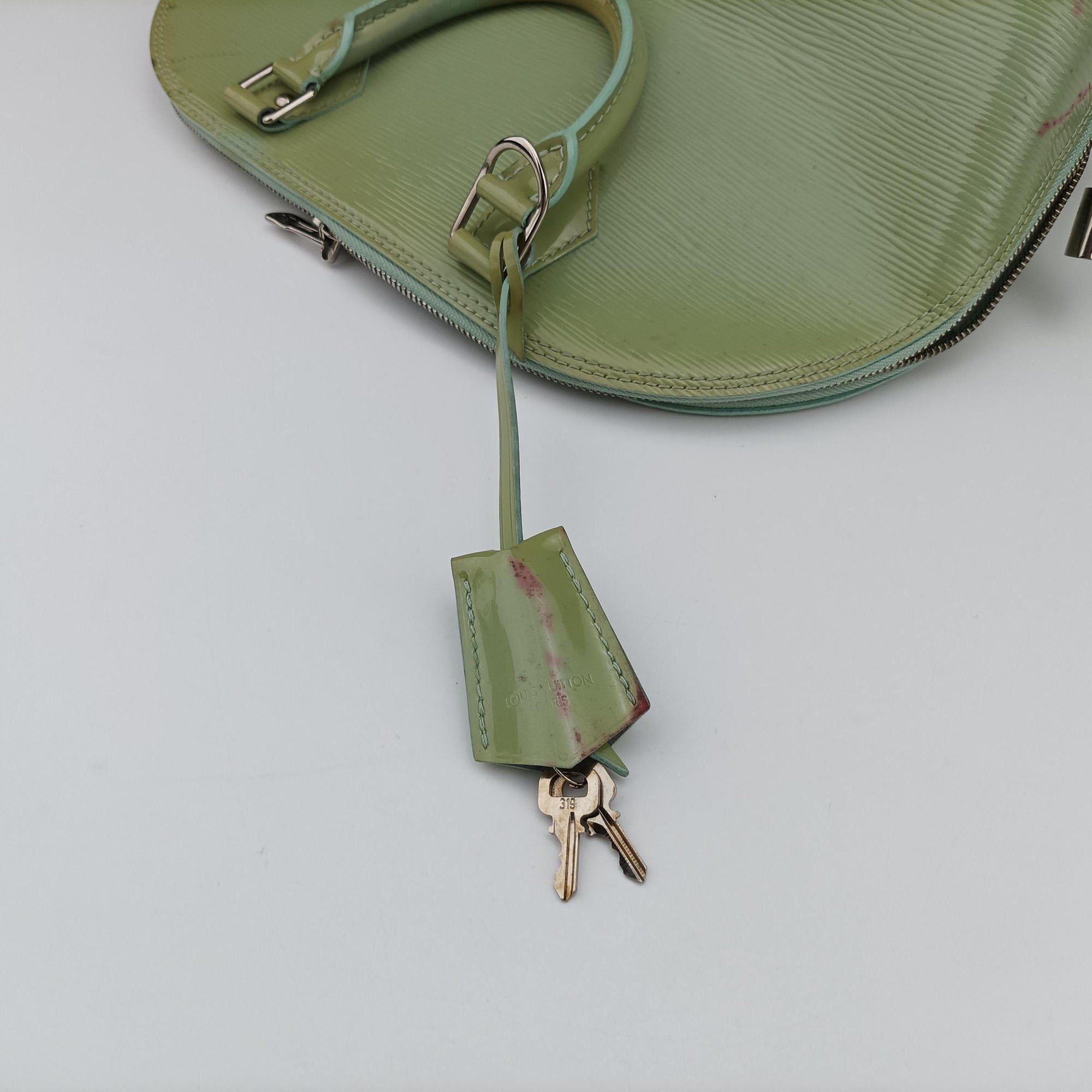 Pre-owned Louis Vuitton Alma PM Amando Electric epi M40625 handbag | stylenewstar