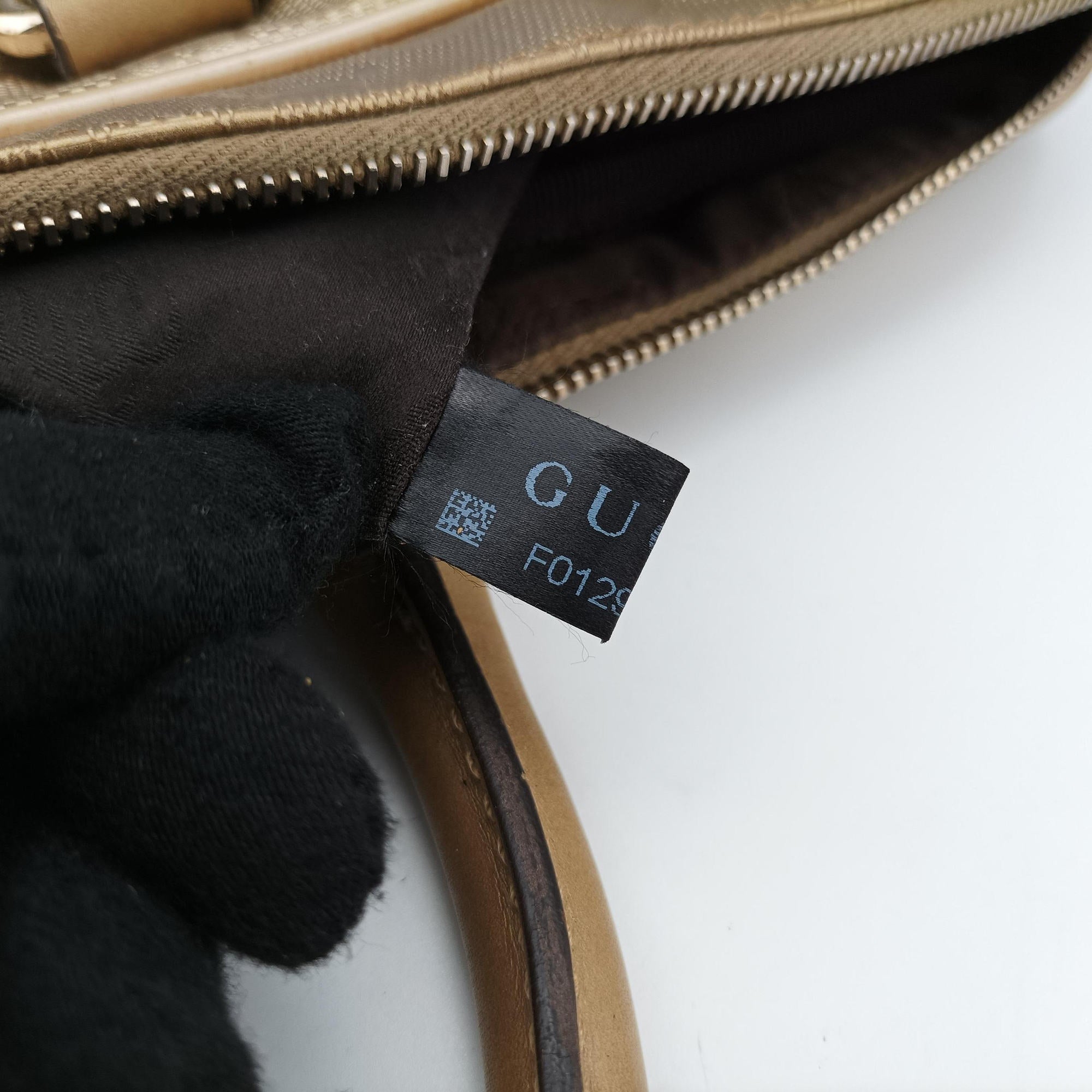 Pre-owned Gucci Diamante Golden PVC coated canvas 208463 handbag | stylenewstar