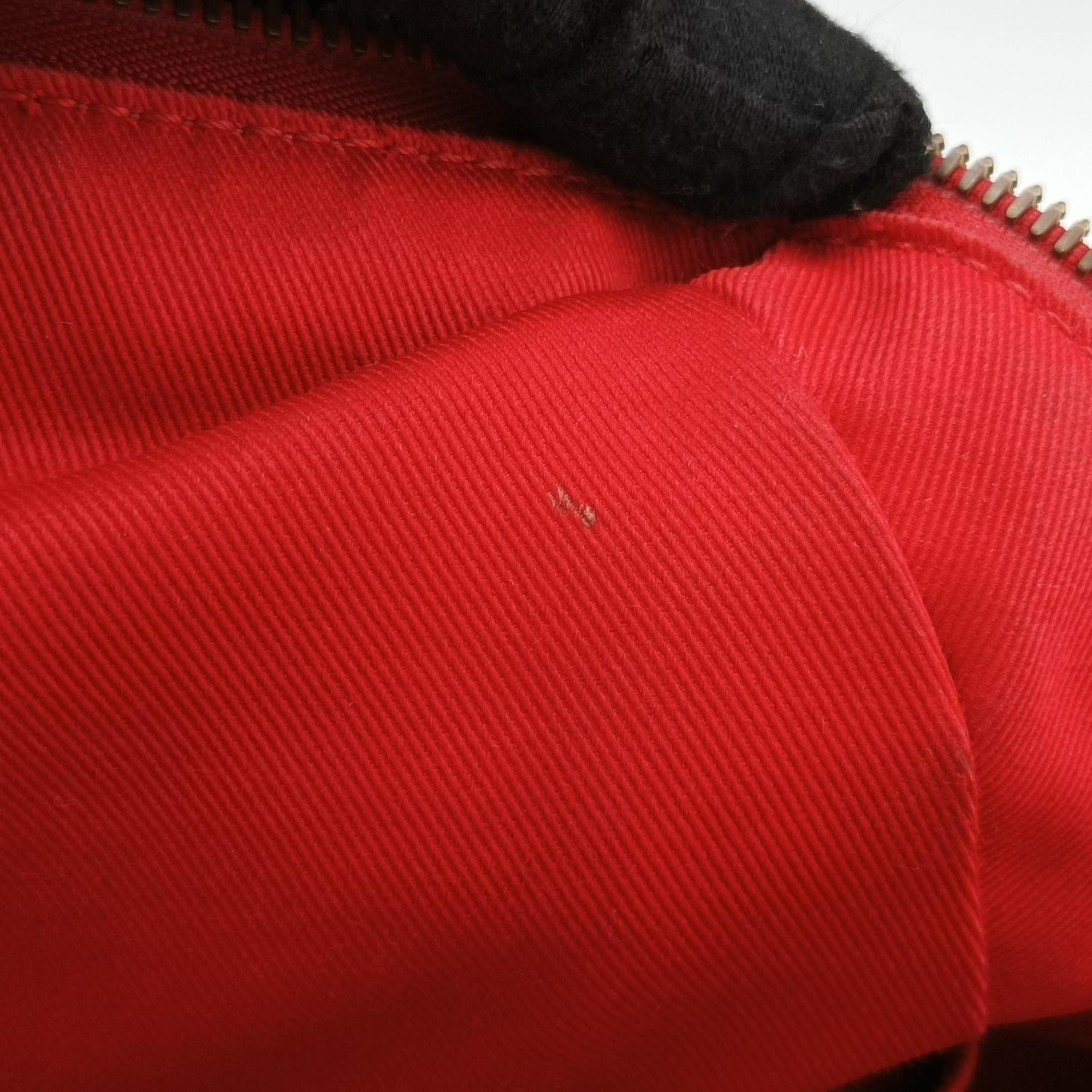 Pre-owned Louis Vuitton Pontus PM Red Monogram Empreinte M43720 handbag | stylenewstar
