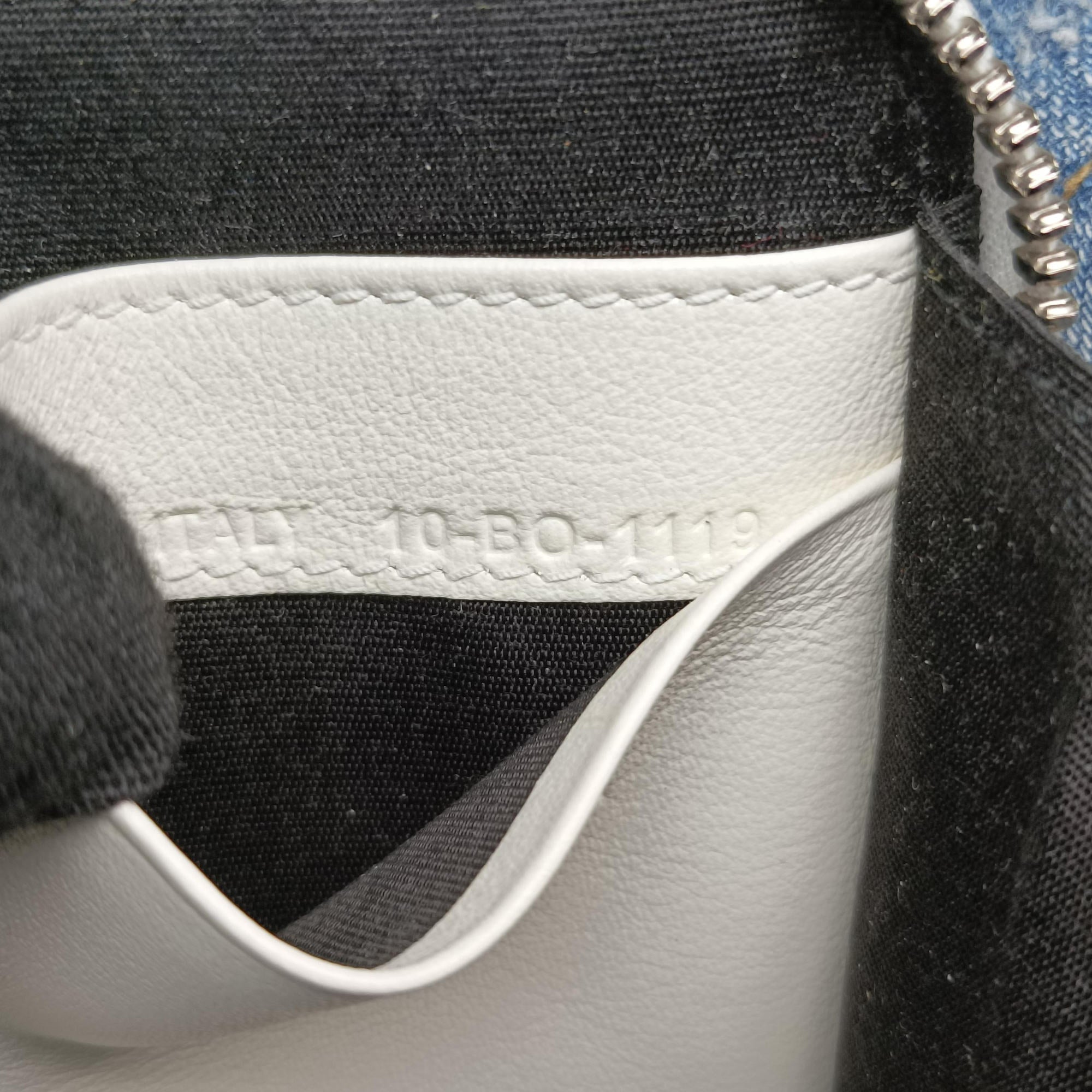 Vintage Christian Dior Daniel Arsham collaboration Newspaper Print White Leather  shoulderbag | stylenewstar