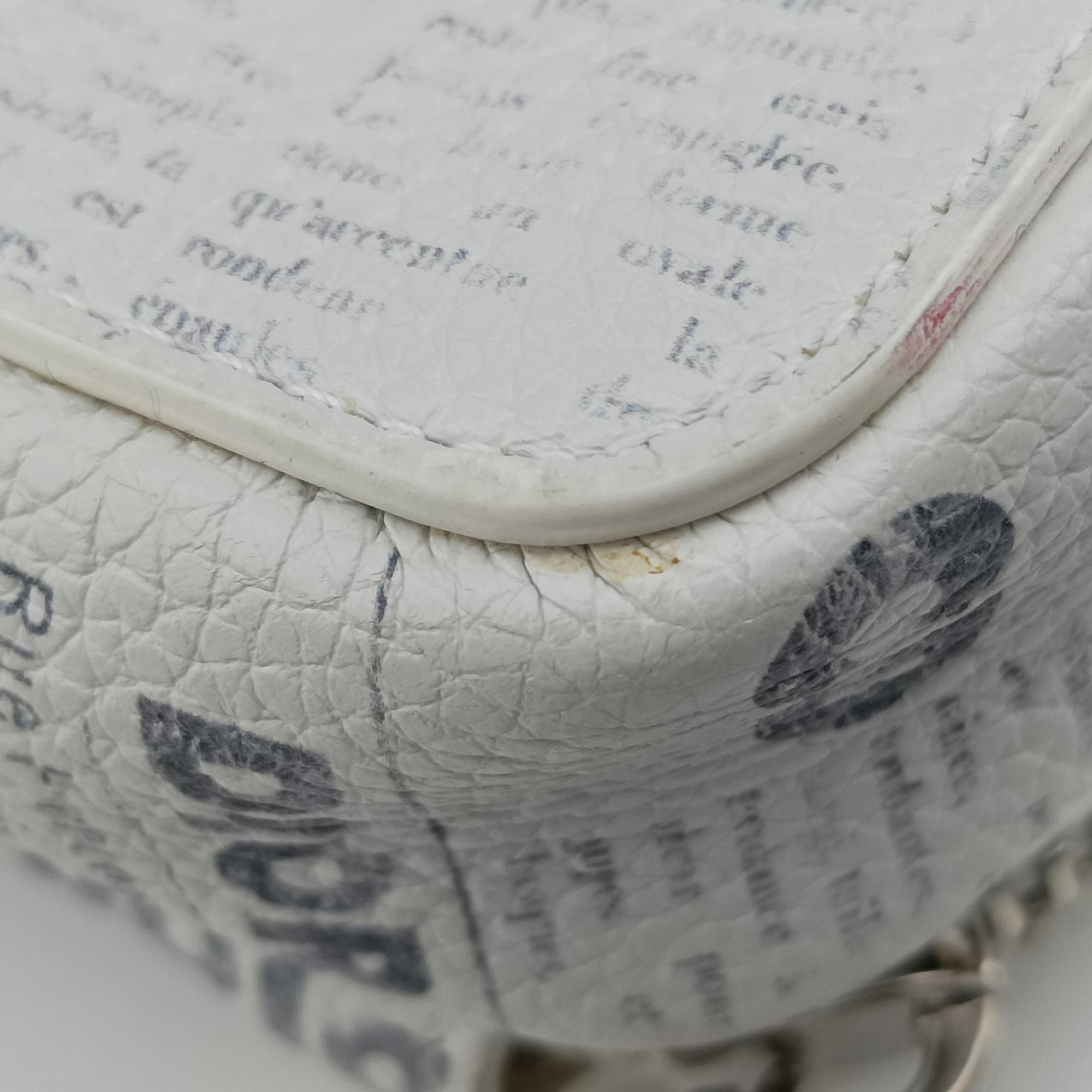 Vintage Christian Dior Daniel Arsham collaboration Newspaper Print White Leather  shoulderbag | stylenewstar