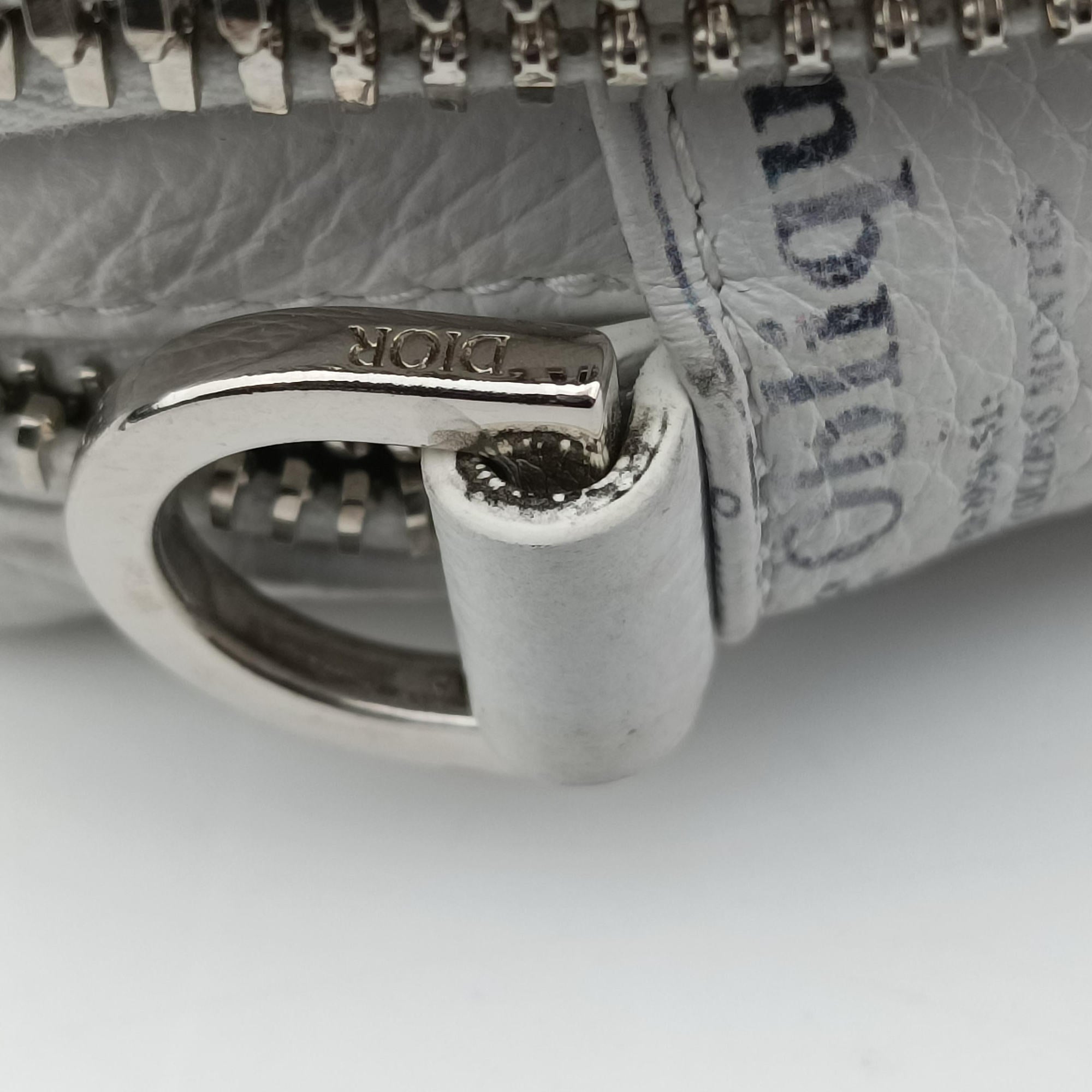 Vintage Christian Dior Daniel Arsham collaboration Newspaper Print White Leather  shoulderbag | stylenewstar