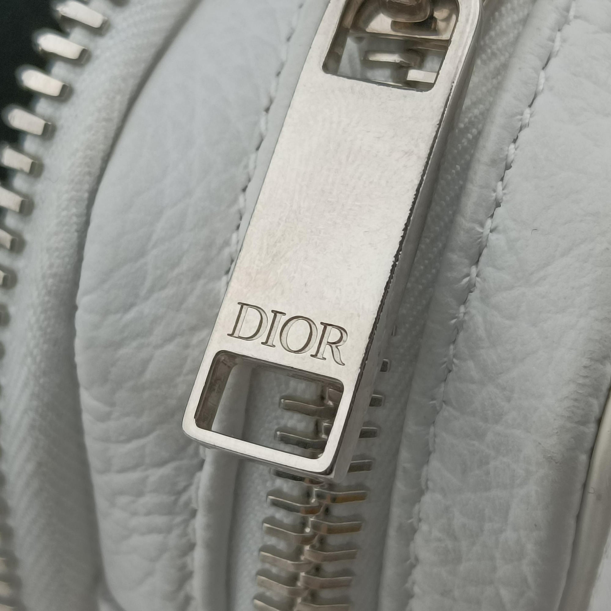 Vintage Christian Dior Daniel Arsham collaboration Newspaper Print White Leather  shoulderbag | stylenewstar