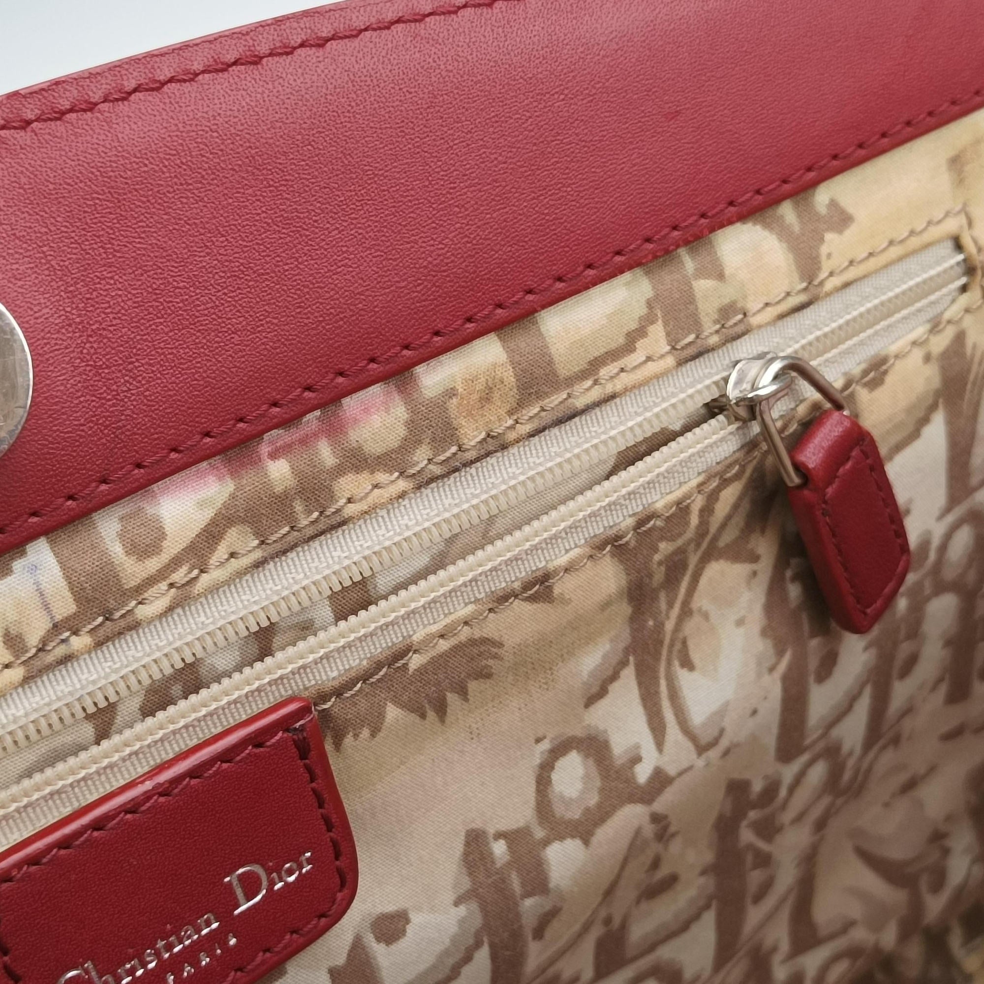 Pre-owned Christian Dior D charm Red Leather  handbag | stylenewstar