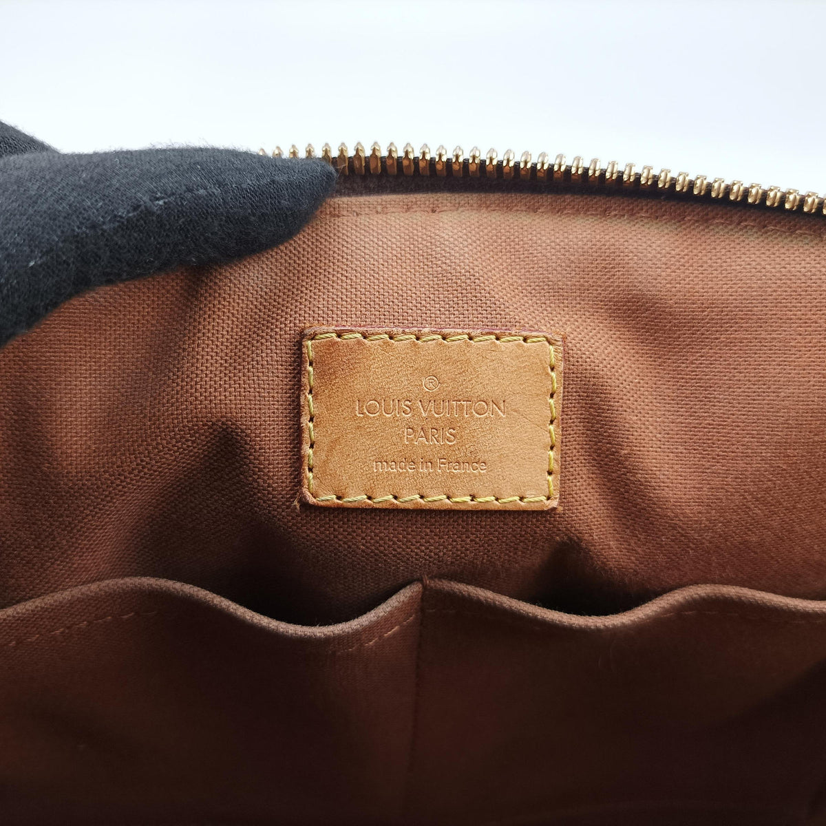 Secondhand Louis Vuitton TIVOLI PM brown Monogram Canvas M40143 handbag | stylenewstar