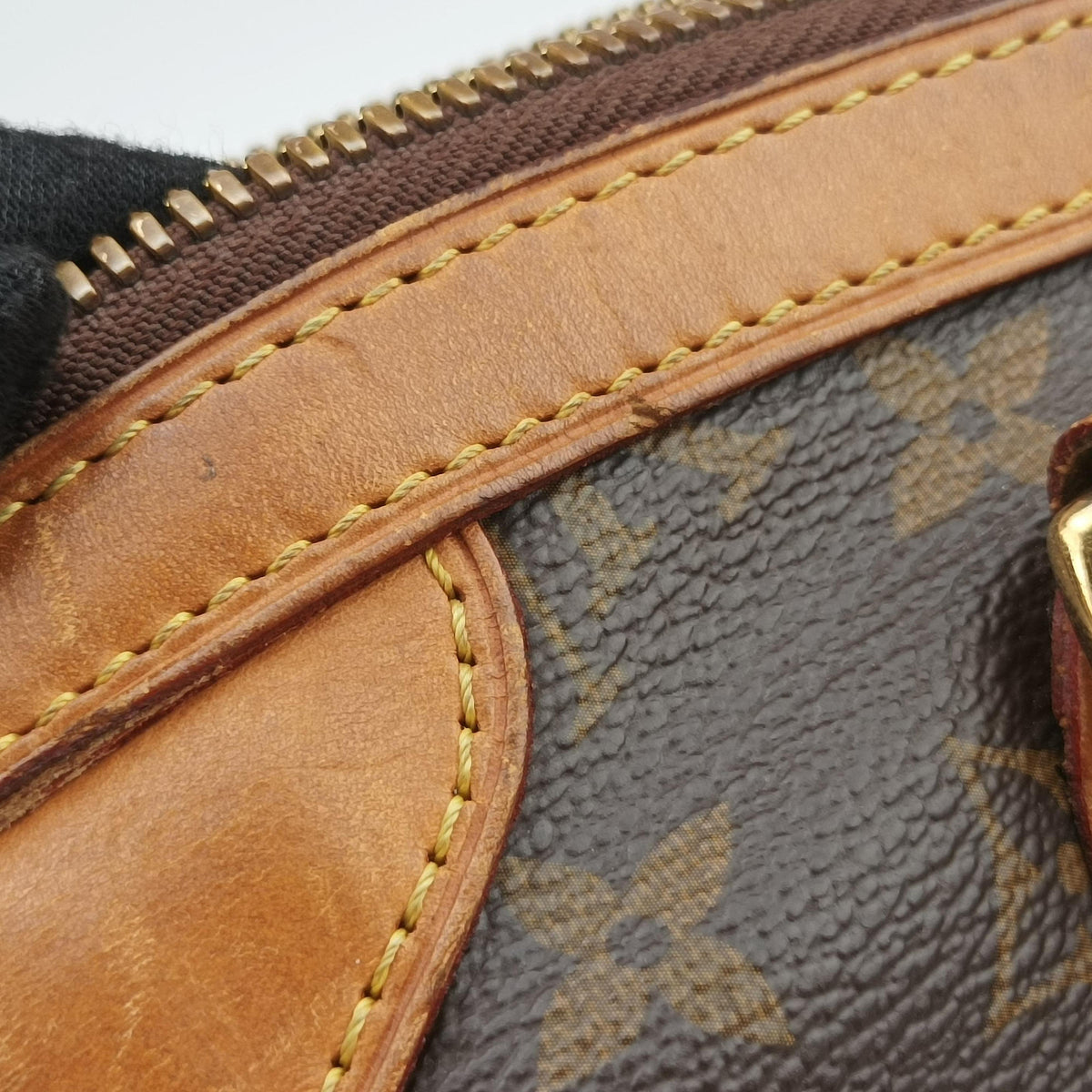 Secondhand Louis Vuitton TIVOLI PM brown Monogram Canvas M40143 handbag | stylenewstar