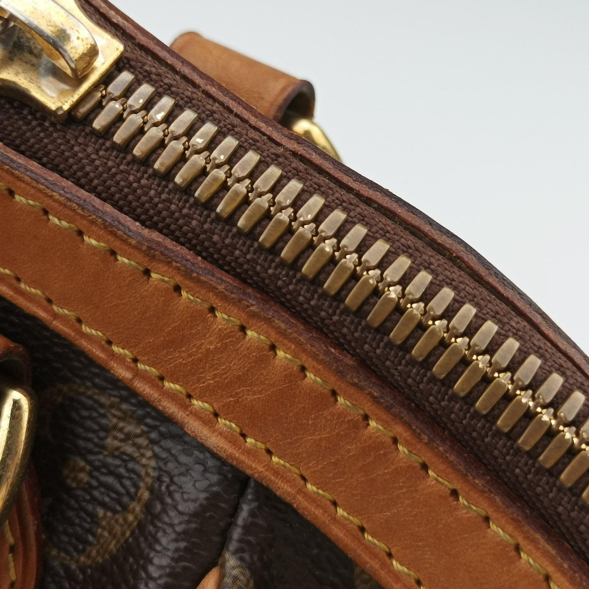 Secondhand Louis Vuitton TIVOLI PM brown Monogram Canvas M40143 handbag | stylenewstar