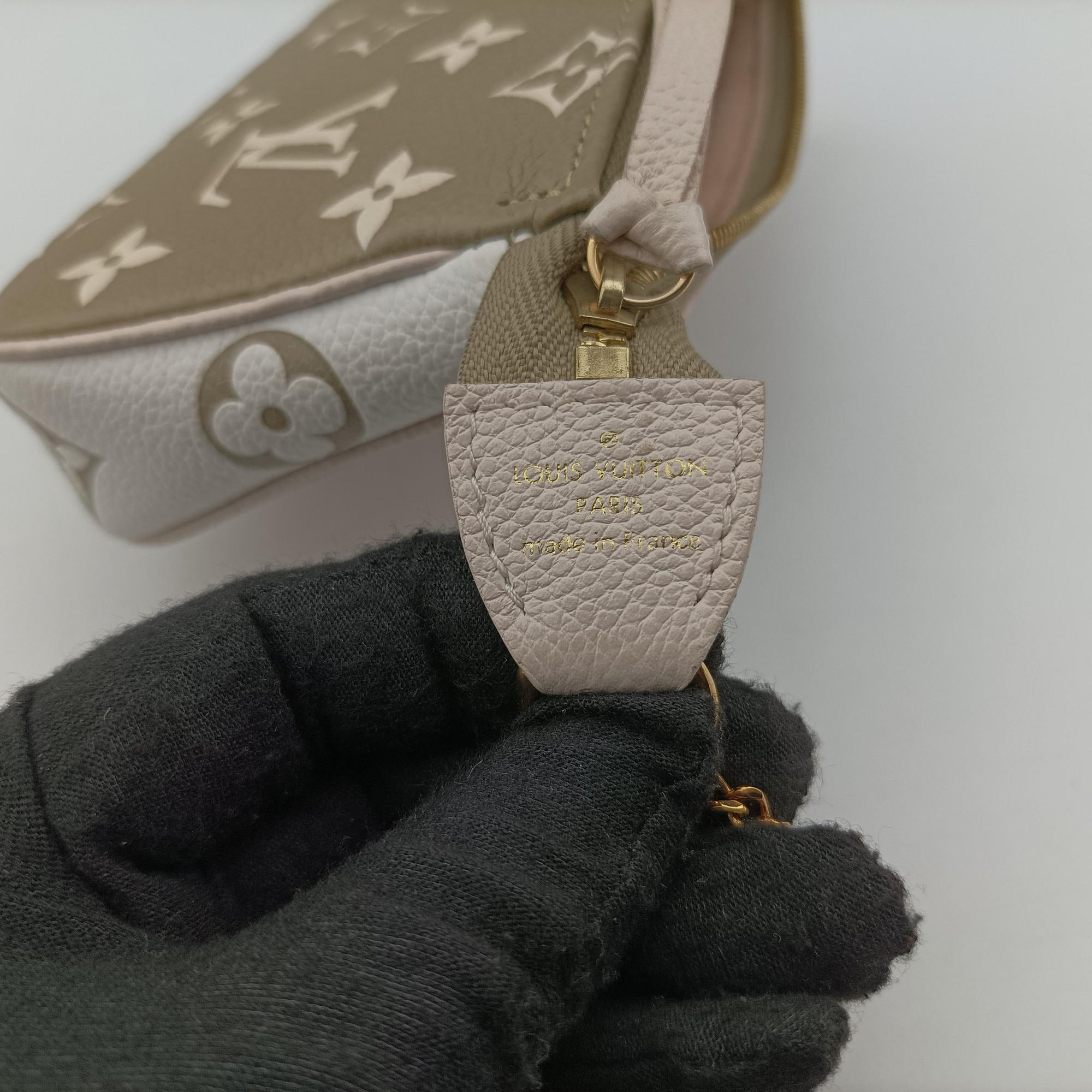 Pre-owned Louis Vuitton Mini Pochette Accessoires Khaki × Beige Monogram Empreinte M81284 handbag | stylenewstar