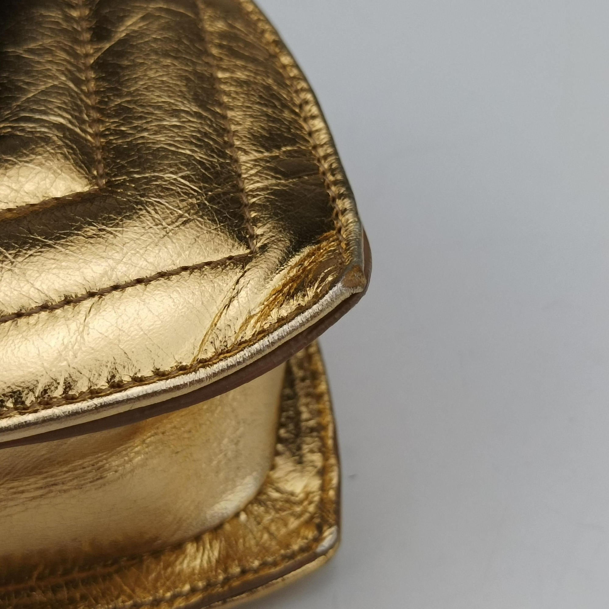 Vintage Yves Saint Laurent Love heart V stitch Golden Leather 448050 shoulderbag | stylenewstar