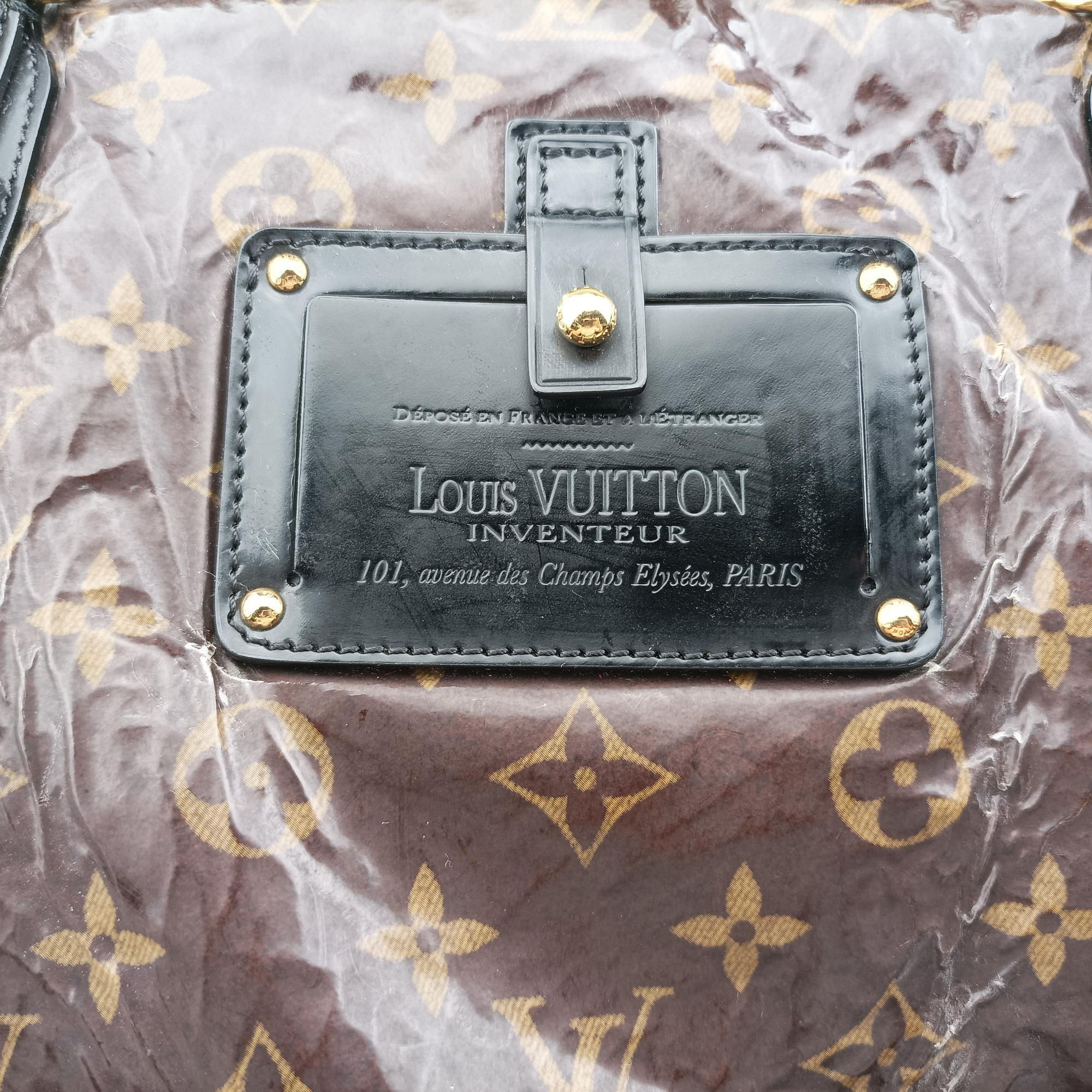 Pre-owned Louis Vuitton Monogram Shearling Thunder Tote Brown Monogram × Cream Coated Monogram Canvas x Shearling x Patent M95573 handbag | stylenewstar