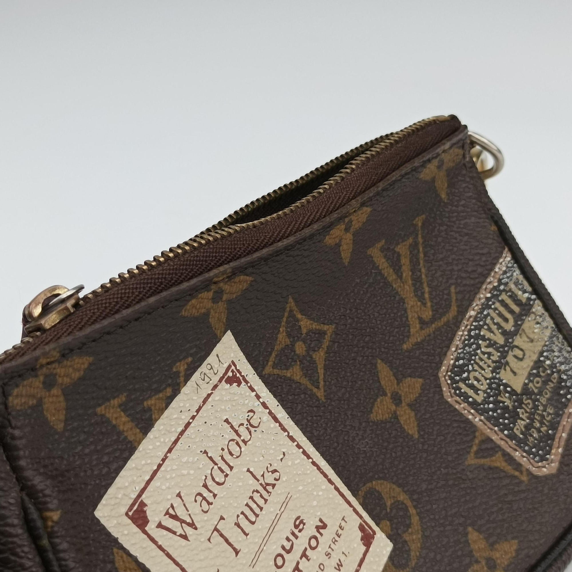 Secondhand Louis Vuitton Mini Pochette Accessoires Brown Monogram Canvas M63798 handbag | stylenewstar