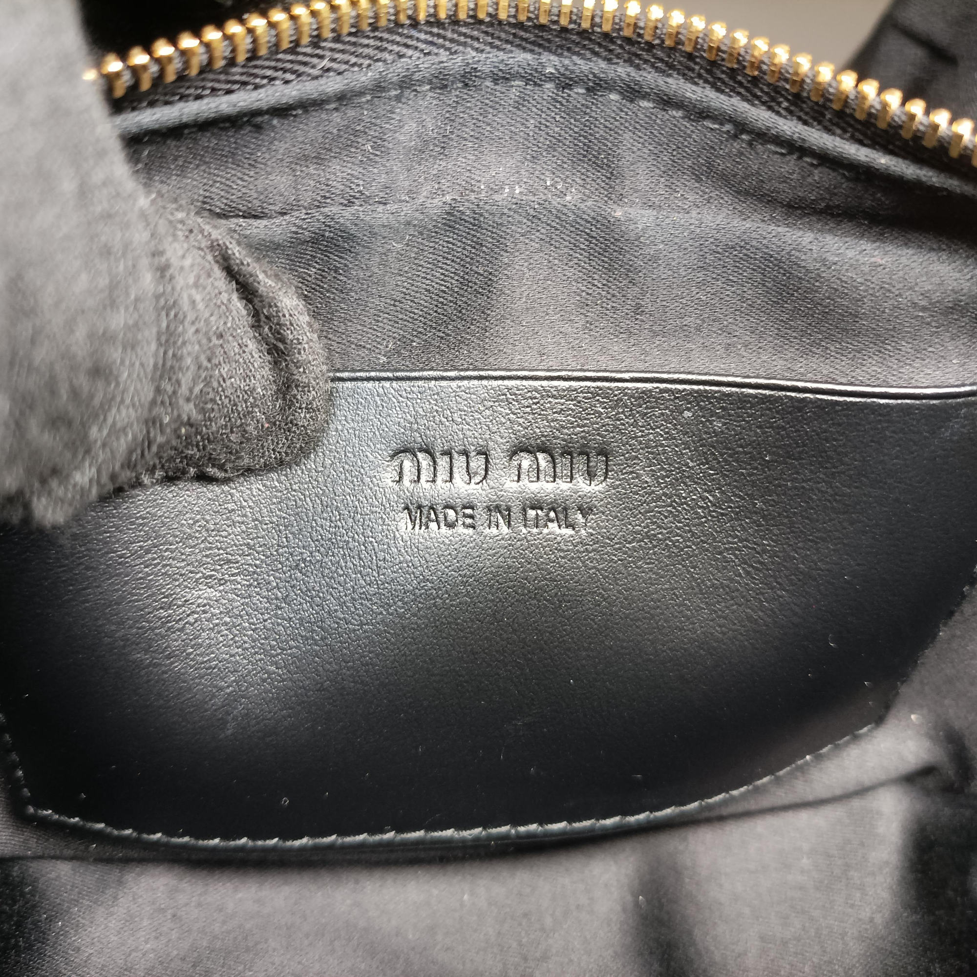 Pre-owned Miu Miu logo Black leather  bum bag/waist bag | stylenewstar