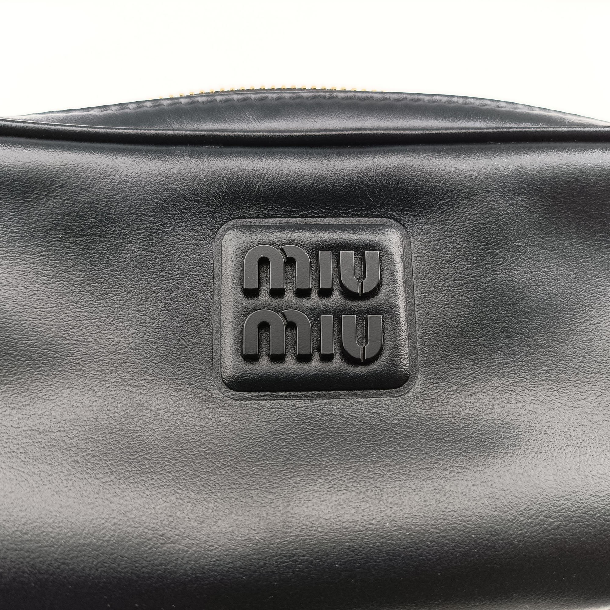 Pre-owned Miu Miu logo Black leather  bum bag/waist bag | stylenewstar