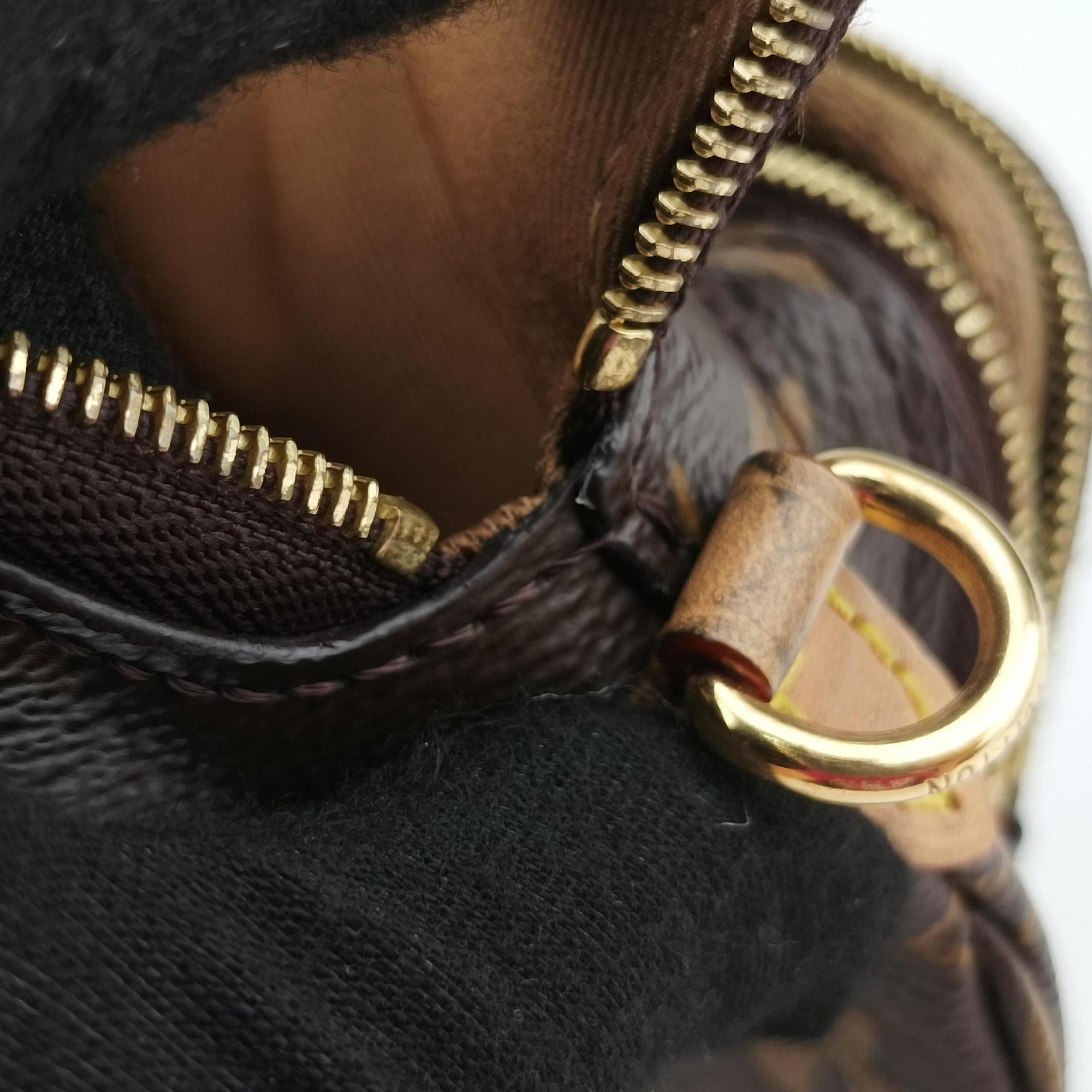 Secondhand Louis Vuitton Utility Phone Sleeve Brown Monogram Canvas M80746 shoulderbag | stylenewstar