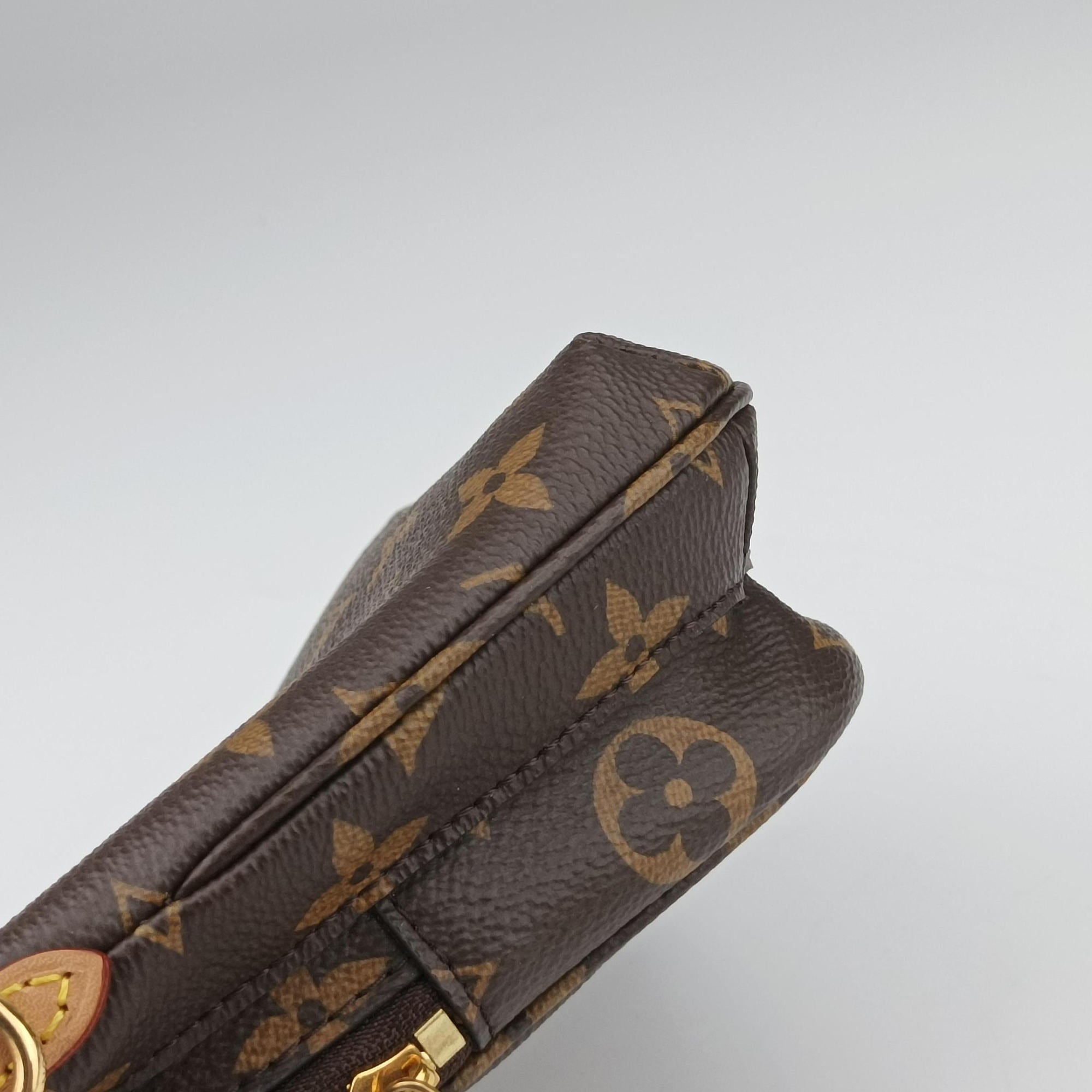 Secondhand Louis Vuitton Utility Phone Sleeve Brown Monogram Canvas M80746 shoulderbag | stylenewstar