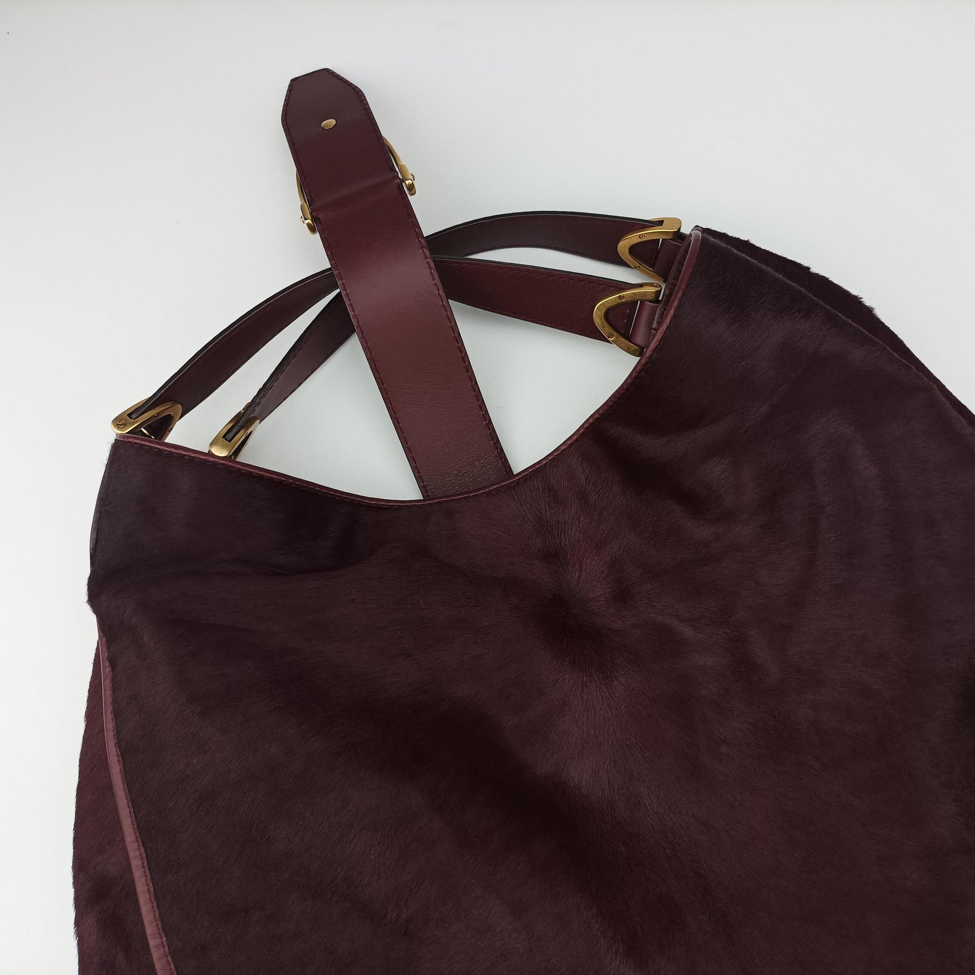 Secondhand Gucci Stirrup Exotic Horsebit Burgundy ponyhair 296855 handbag | stylenewstar