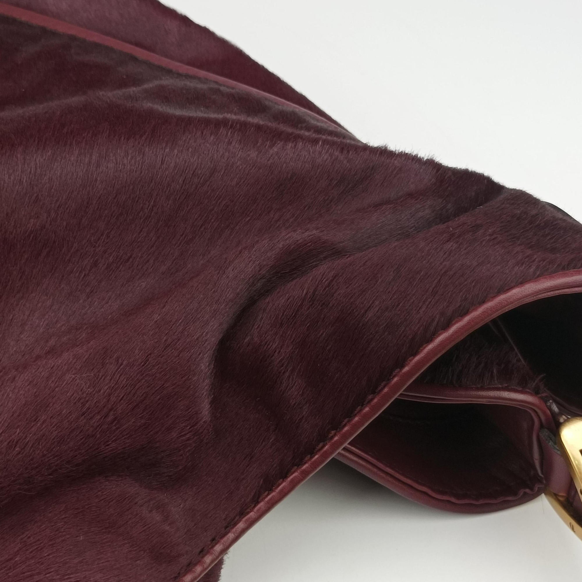 Secondhand Gucci Stirrup Exotic Horsebit Burgundy ponyhair 296855 handbag | stylenewstar