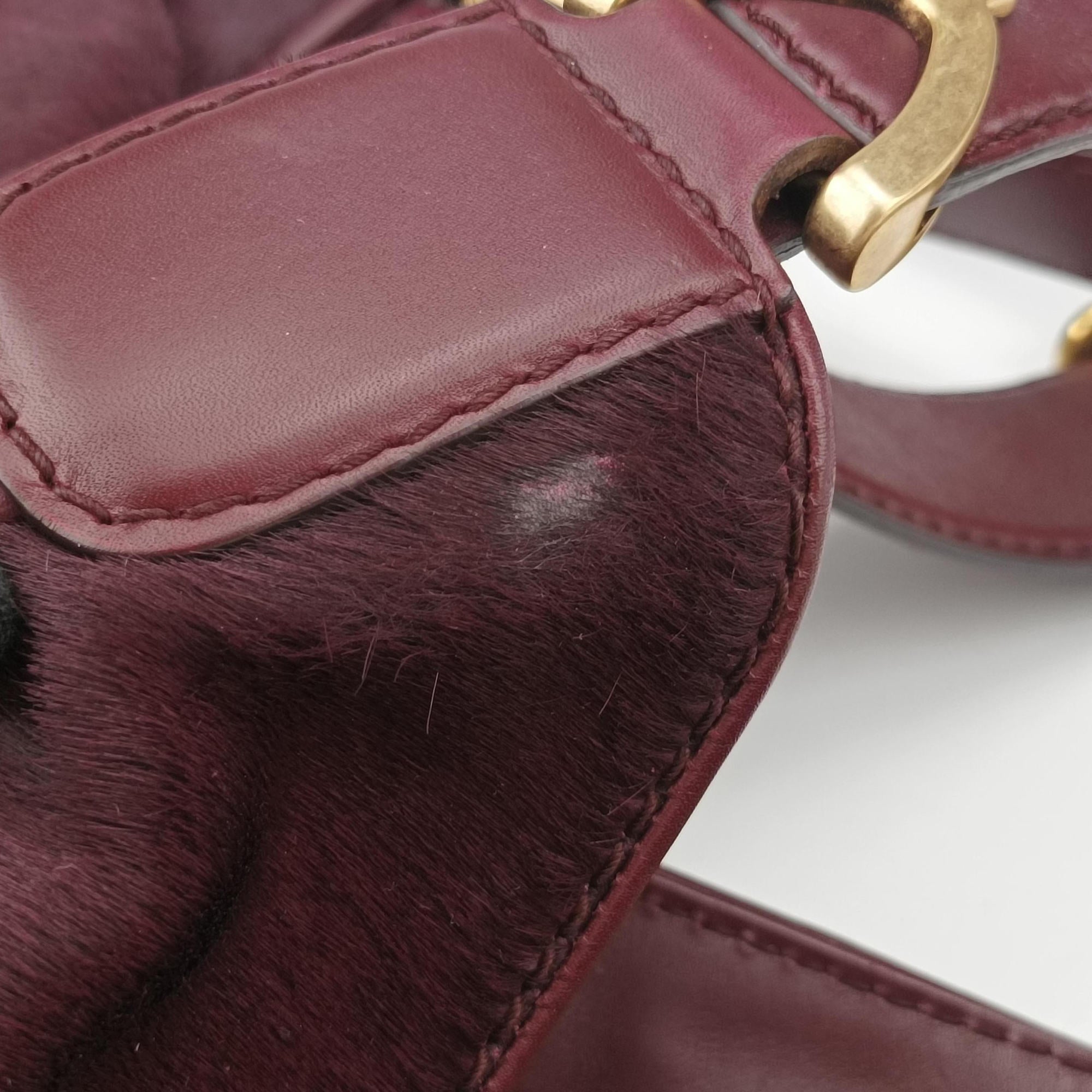 Secondhand Gucci Stirrup Exotic Horsebit Burgundy ponyhair 296855 handbag | stylenewstar