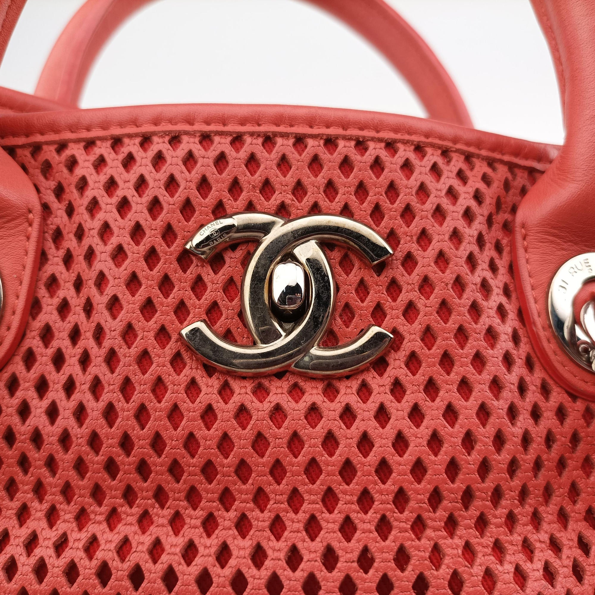 Vintage Chanel Up in the Air Perforated French Riviera Orange lambskin A67654 shoulderbag | stylenewstar