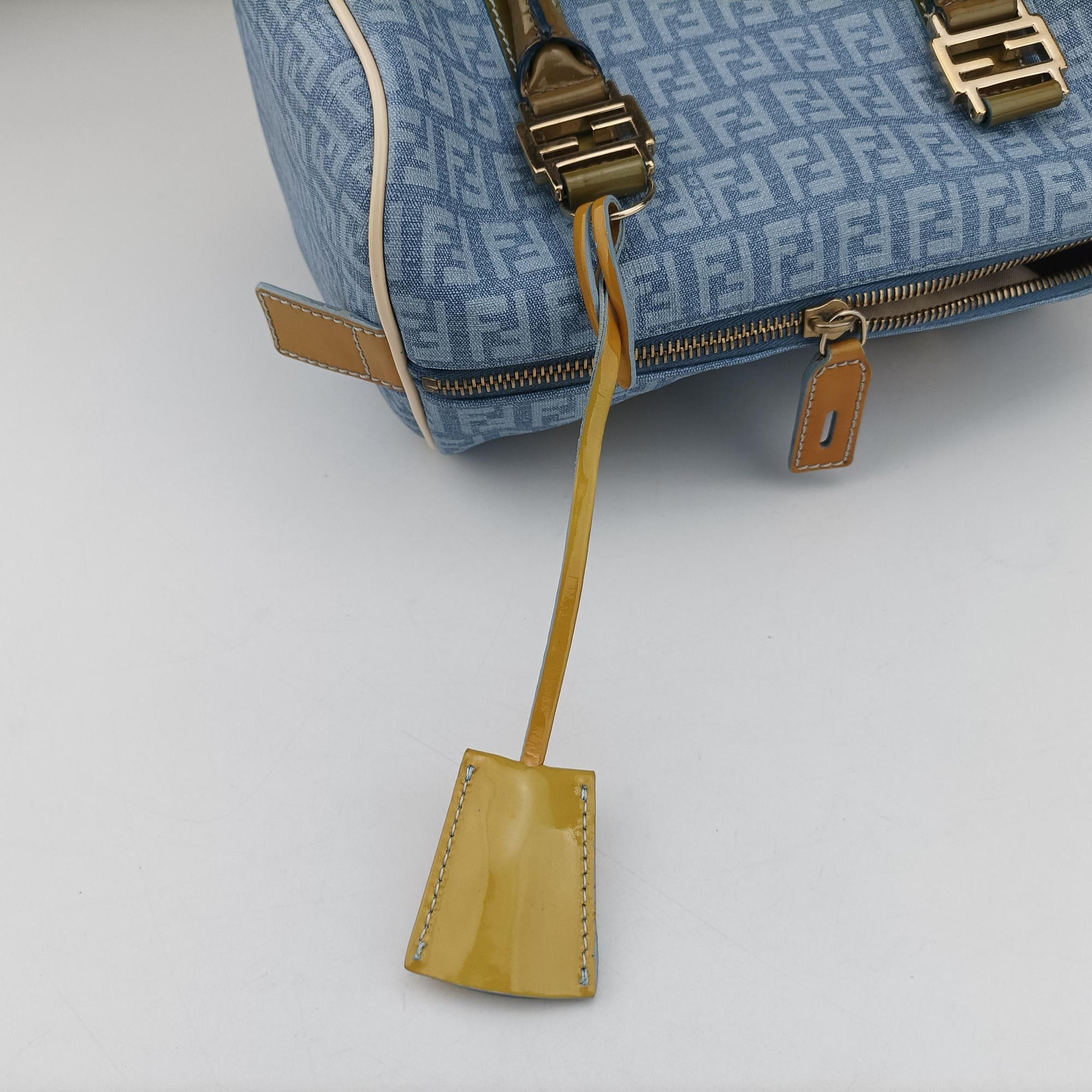 Pre-owned Fendi Zucchino Glitter Logo Blue PVC coated canvas 8BL068 handbag | stylenewstar