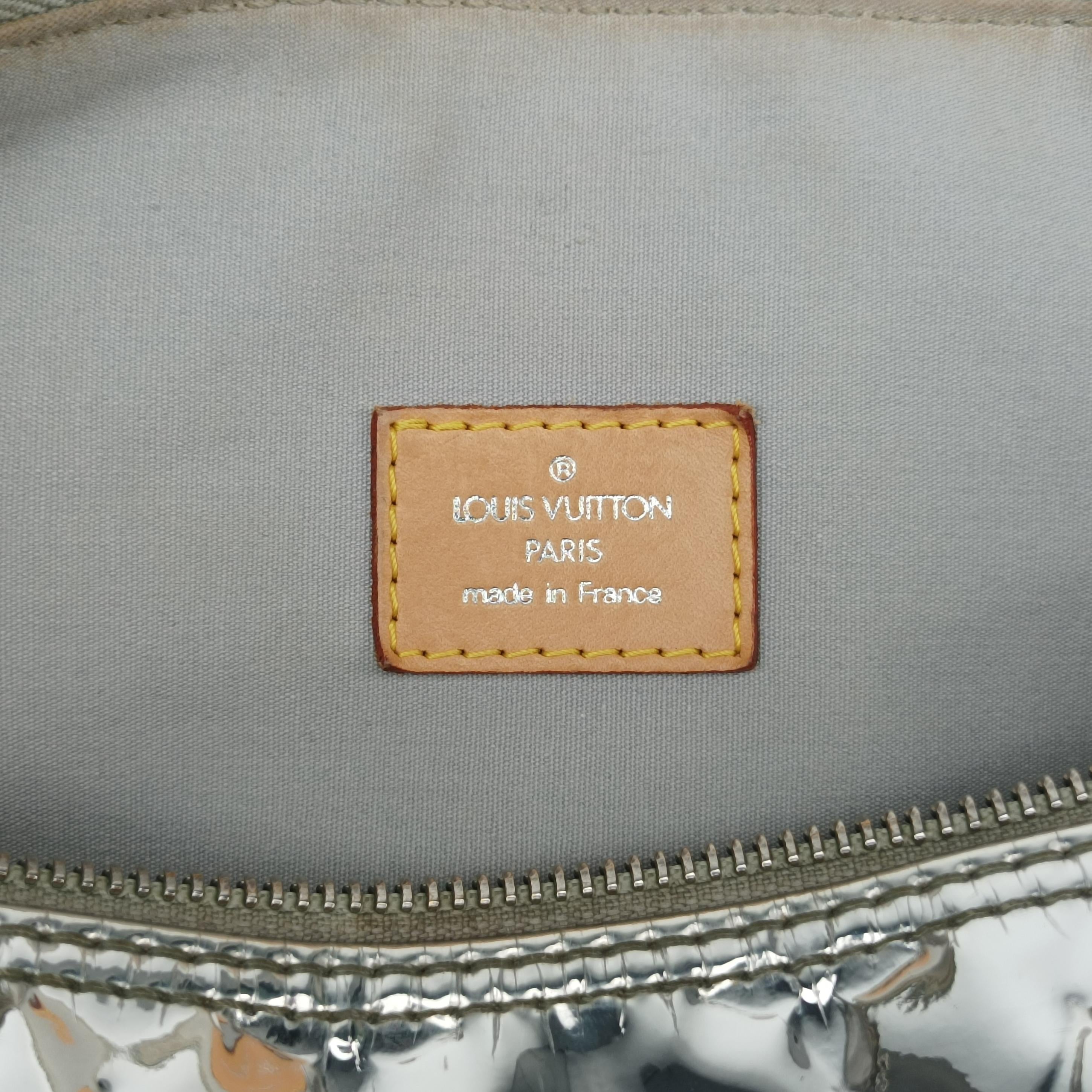 Secondhand Louis Vuitton Speedy 30 Silver Monogram Miroir M95271 handbag | stylenewstar