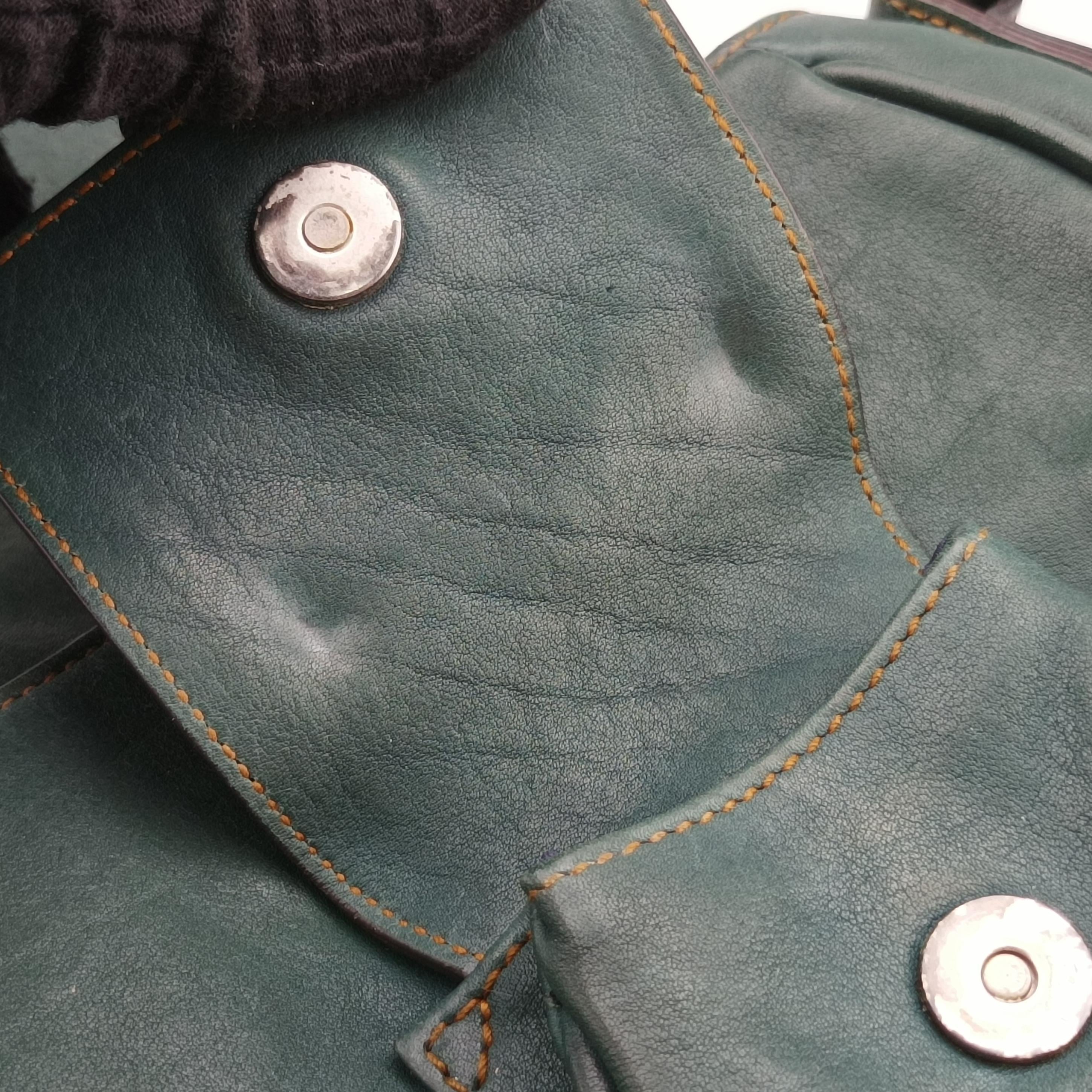 Pre-owned Christian Dior Gaucho Green× Brown Leather  handbag | stylenewstar