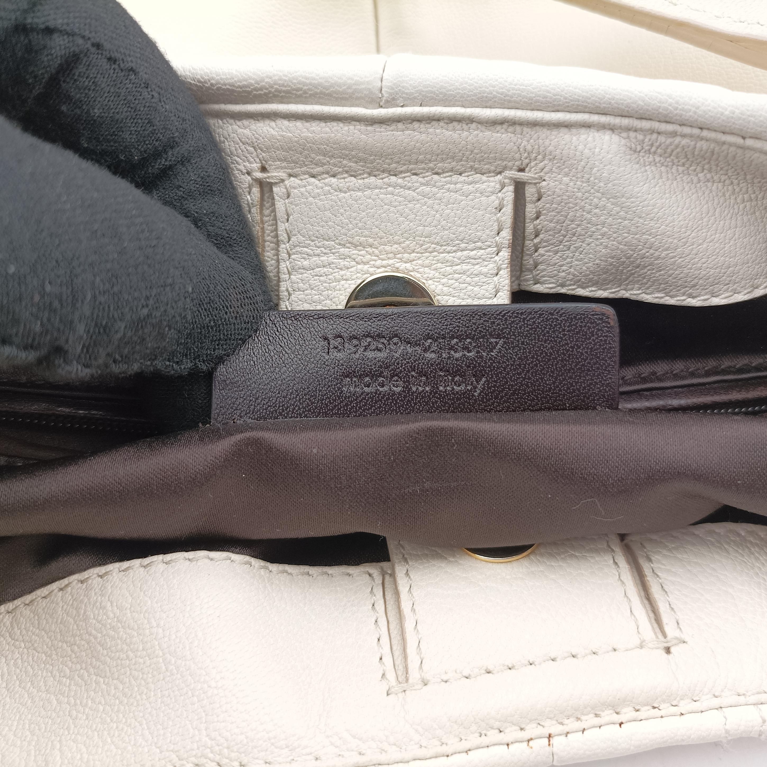 Vintage Yves Saint Laurent Saharienne White Leather 139259 handbag | stylenewstar