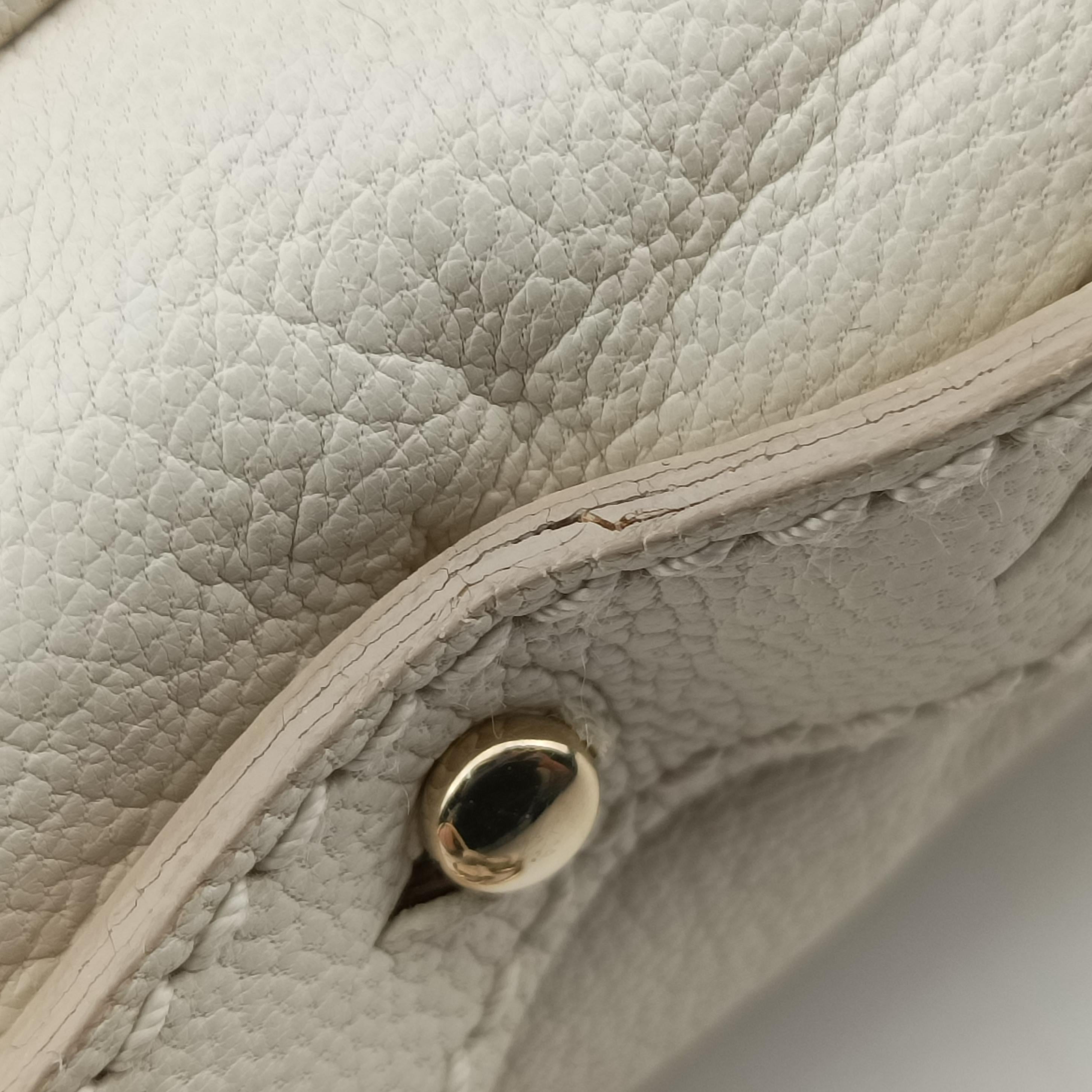 Vintage Yves Saint Laurent Saharienne White Leather 139259 handbag | stylenewstar