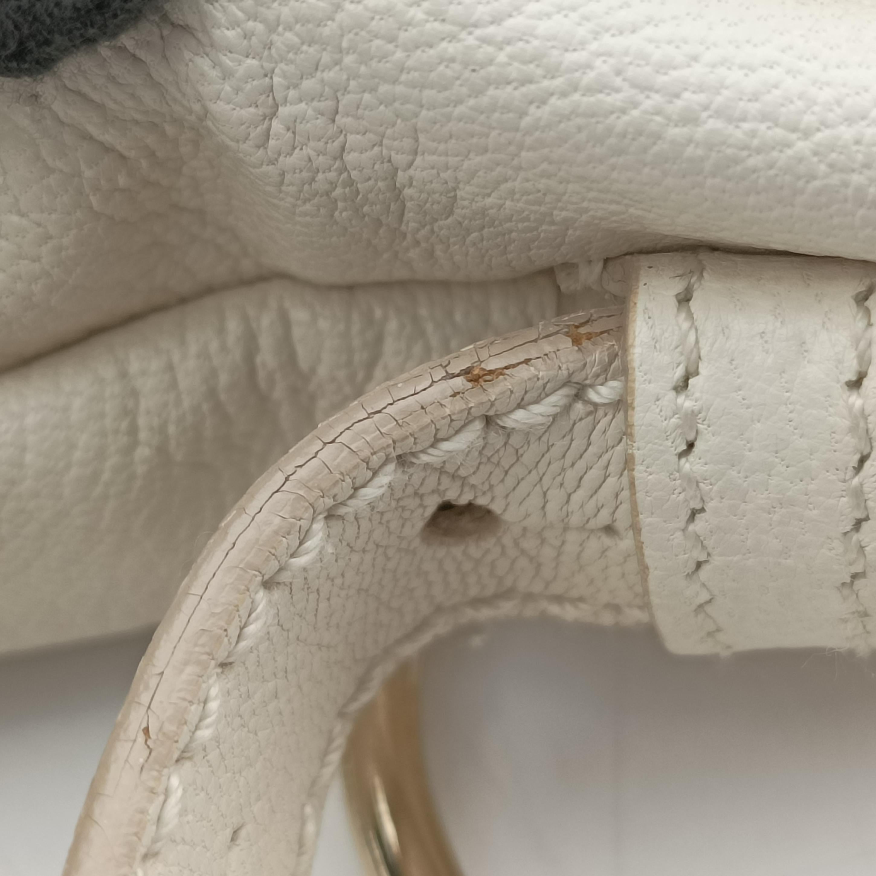 Vintage Yves Saint Laurent Saharienne White Leather 139259 handbag | stylenewstar