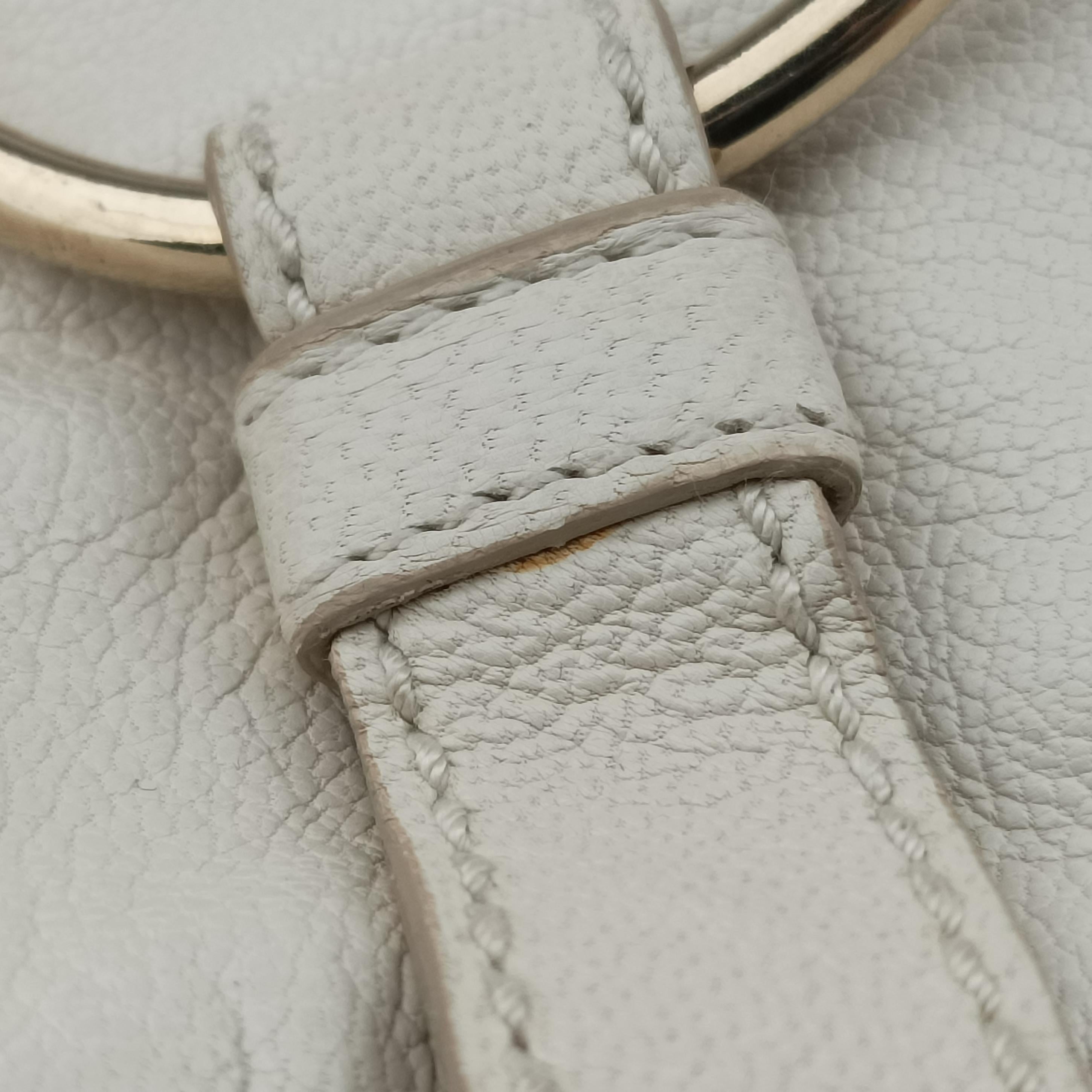 Vintage Yves Saint Laurent Saharienne White Leather 139259 handbag | stylenewstar