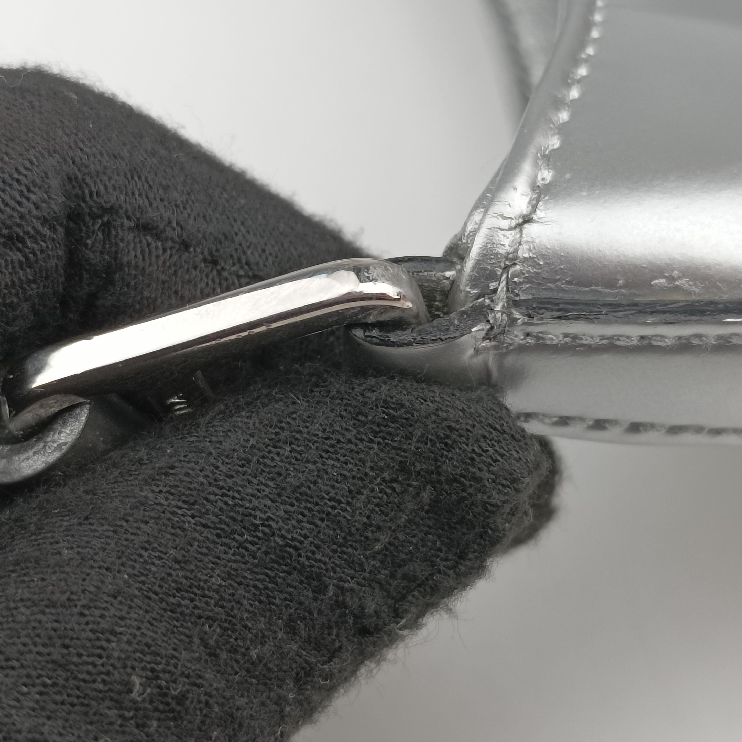 Pre-owned Prada Cleo Silver Enamel 1BC499 handbag | stylenewstar