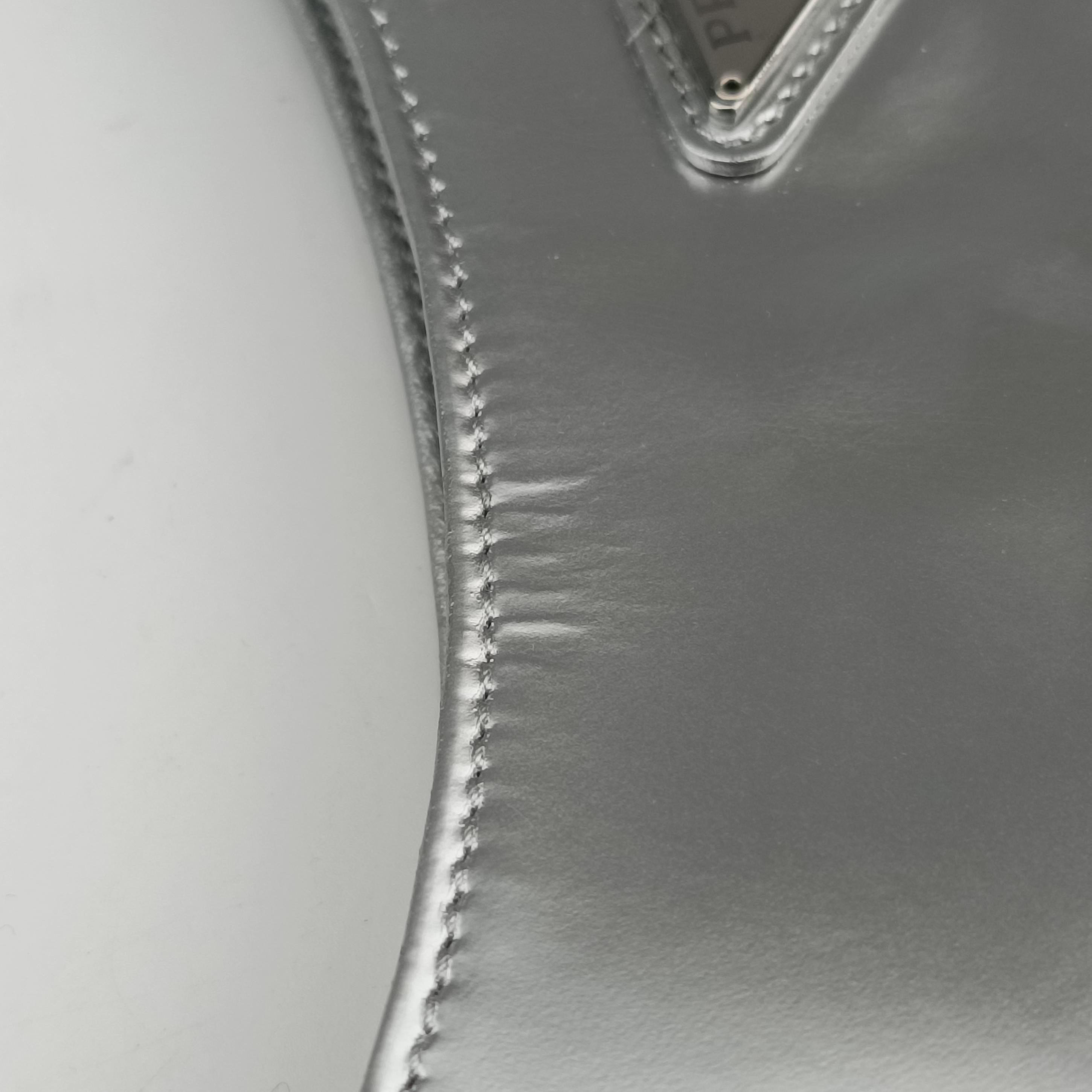 Pre-owned Prada Cleo Silver Enamel 1BC499 handbag | stylenewstar