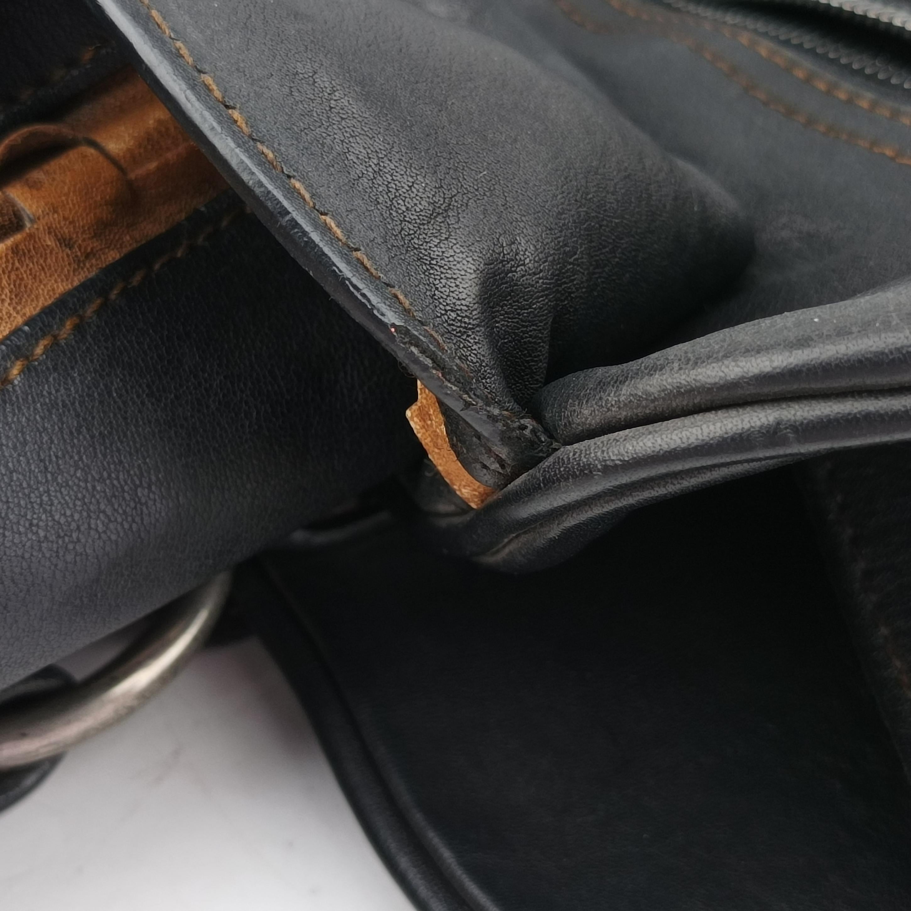 Pre-owned Christian Dior Gaucho Black × Brown Leather  handbag | stylenewstar