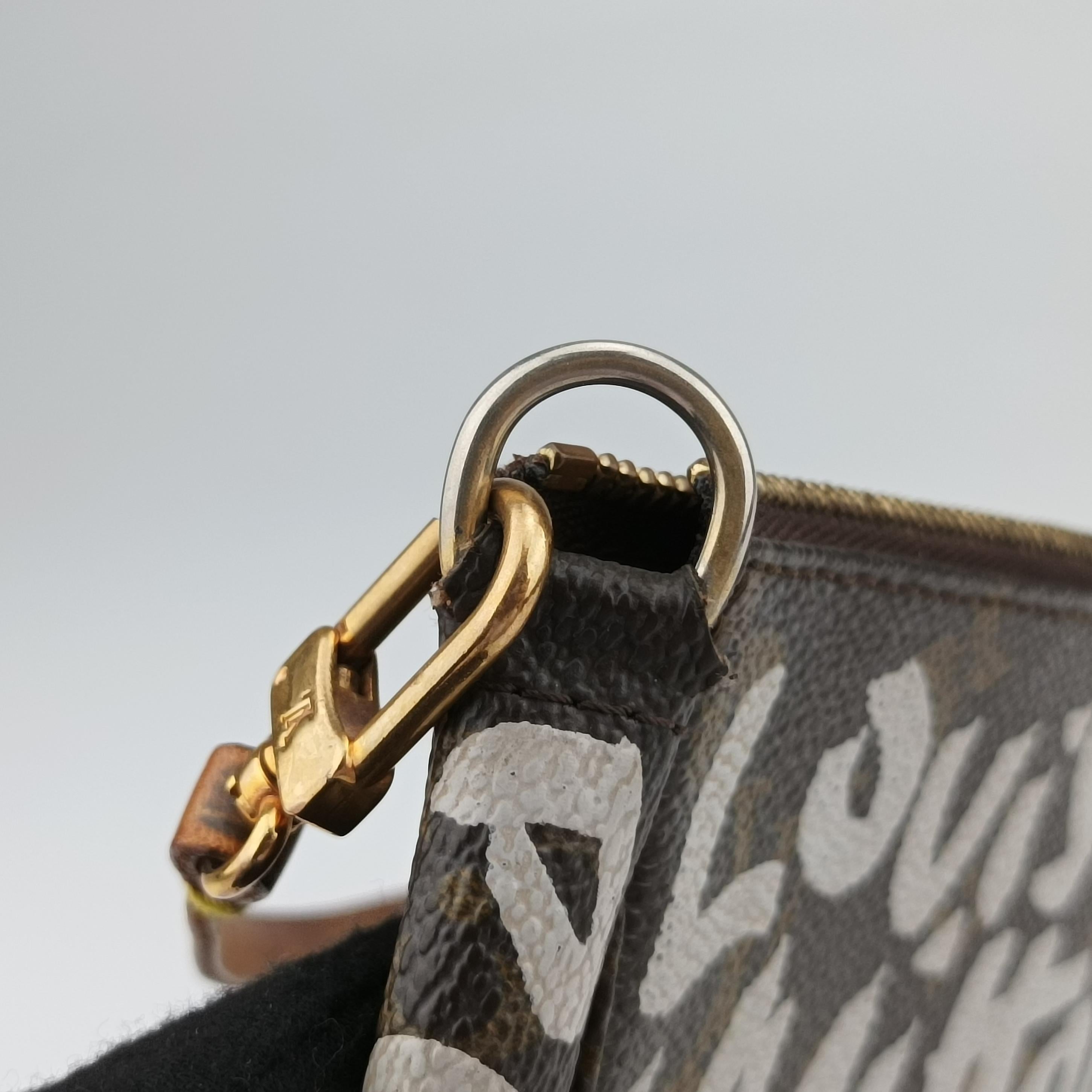 Pre-owned Louis Vuitton Monogram Graffiti Pochette Accessoires Brown×Argent Monogram Graffiti M92192 handbag | stylenewstar