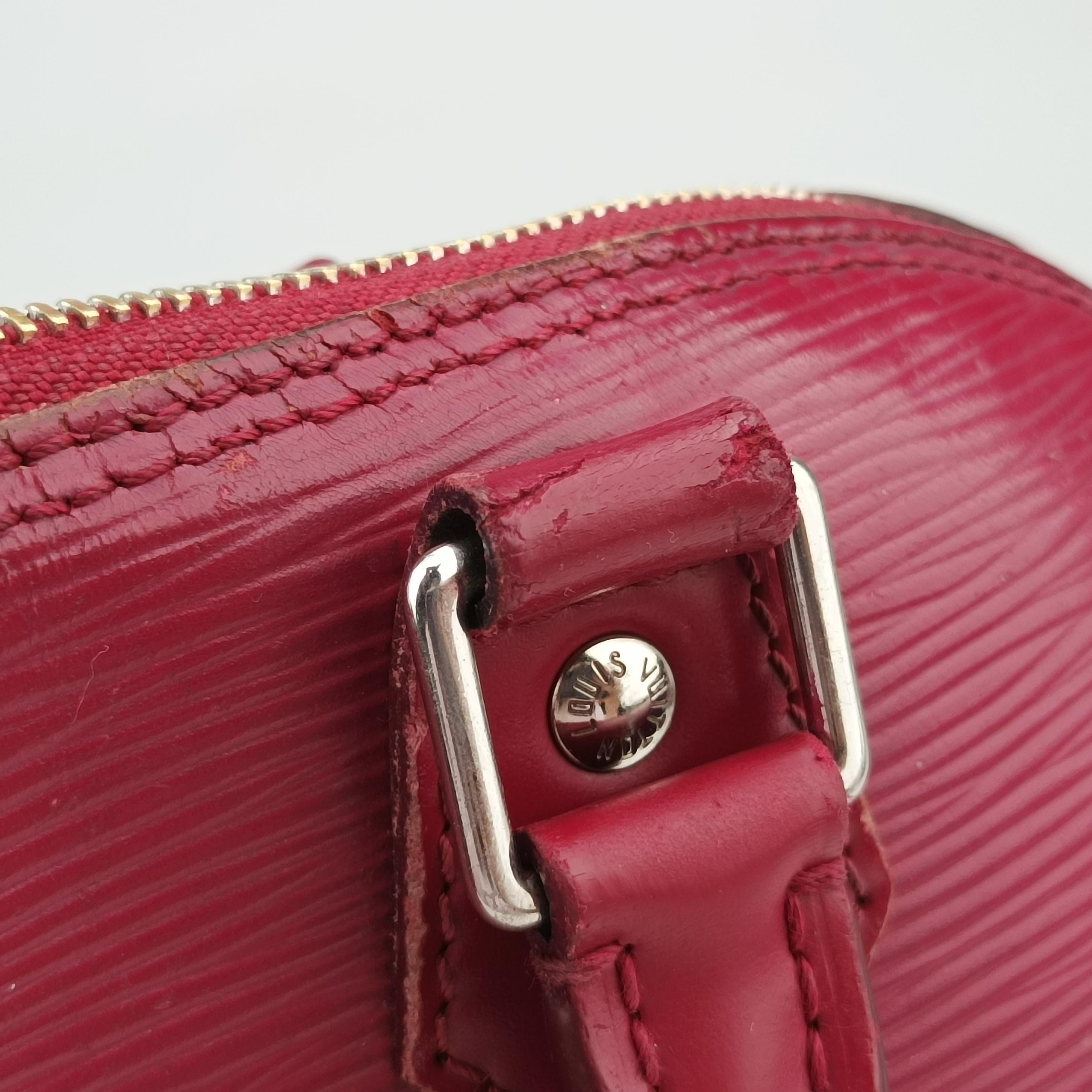 Pre-owned Louis Vuitton ALMA PM CARMIN Epi M4058E handbag | stylenewstar
