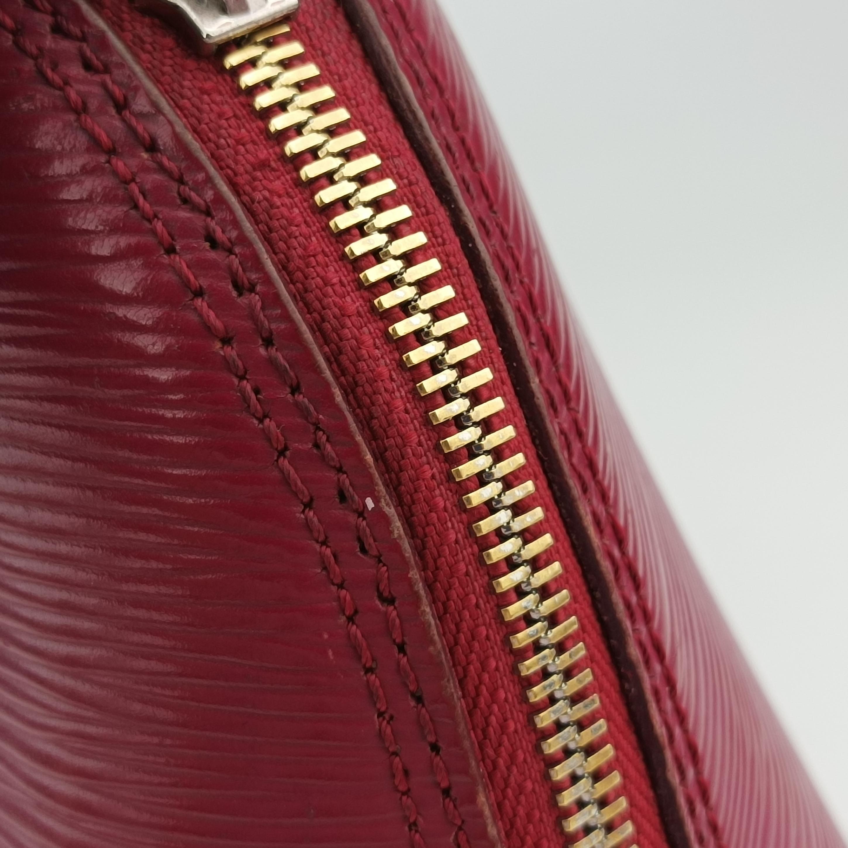 Pre-owned Louis Vuitton ALMA PM CARMIN Epi M4058E handbag | stylenewstar