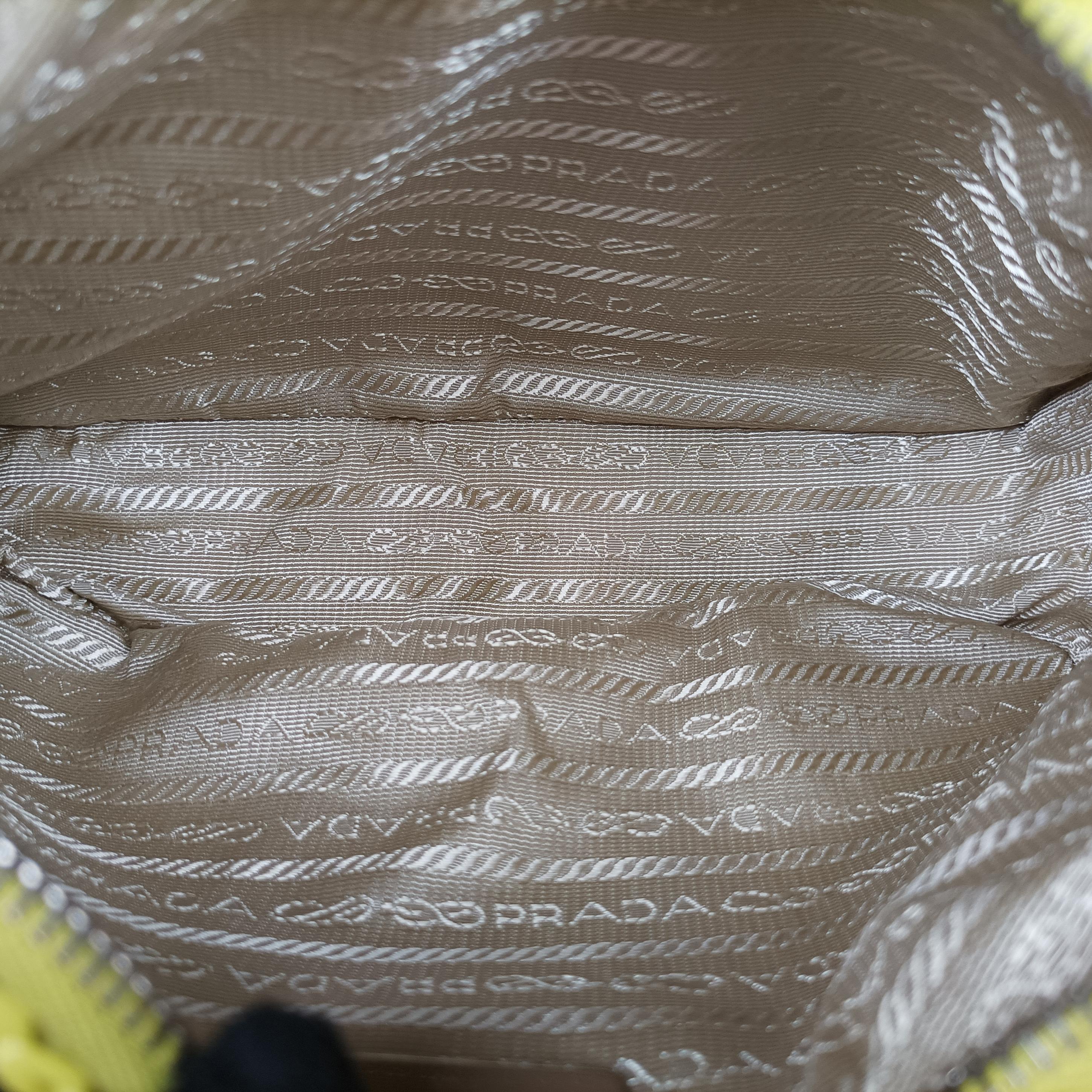 Pre-owned Prada Re-Edition 2005 Yellow x White straw  handbag | stylenewstar
